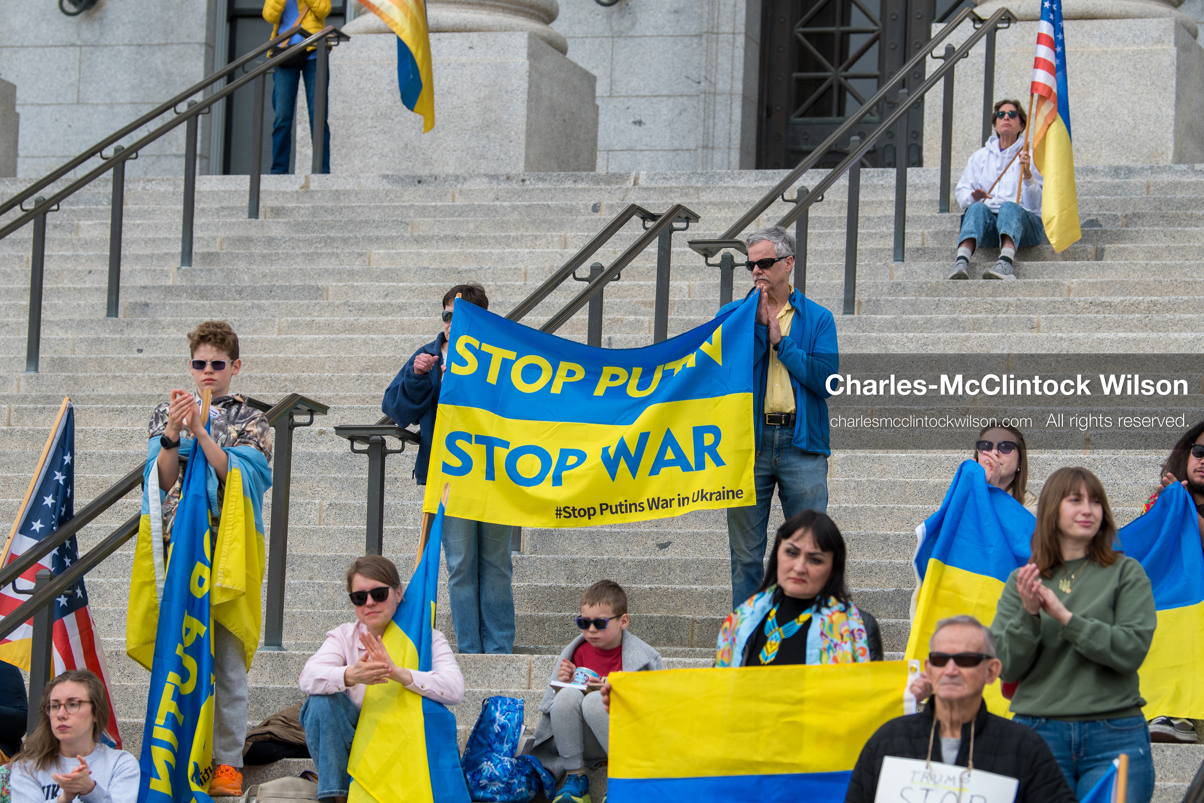 February 28, 2026, Salt Lake City, Utah, USA: Supporters gather on the steps of the Utah State Capitol during the Stand With Ukraine rally marking the four year anniversary of the full scale Russian invasion of Ukraine. Participants hold signs and Ukrainian flags as community members call for continued support for Ukraine and an end to the war. (Credit Image: © Charles McClintock Wilson/ZUMA Press Wire)