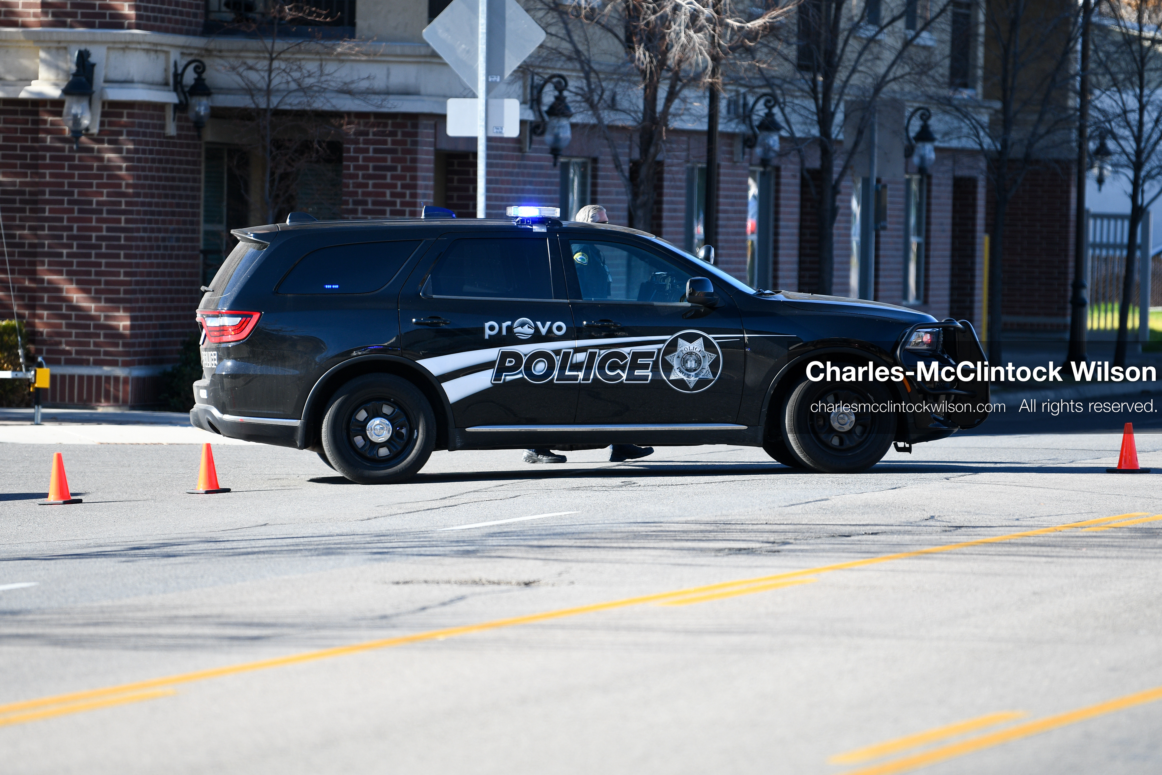 PROVO, UTAH, USA – DECEMBER 11, 2025: A Provo Police cruiser blocks the road near the Fourth District Court in Provo during the first in‑person court appearance of Tyler Robinson in the Charlie Kirk murder case. (Credit Image: © Charles‑McClintock Wilson/ZUMA Press Wire)