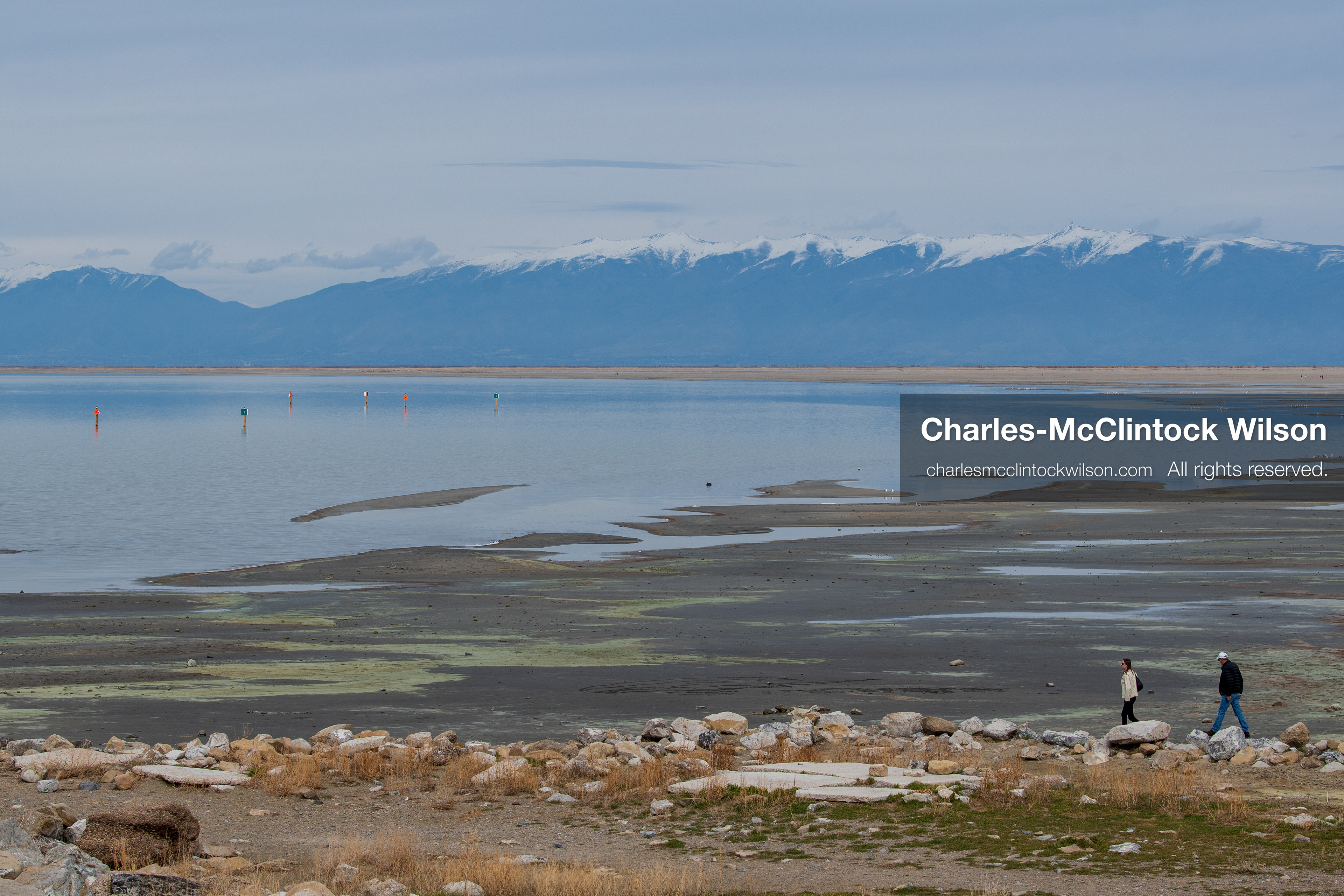 March 1, 2026, Great Salt Lake, Utah, USA: People walk along a path near the shoreline of the Great Salt Lake as the region continues to experience historically low water levels. Reports from state officials and the Great Salt Lake Strike Team state that the lake remains in a serious adverse‑effects range, with elevations among the lowest recorded in more than one hundred years. The lake has drawn increased public attention as lawmakers consider large‑scale water projects and long‑term plans to address declining conditions. (Credit Image: © Charles‑McClintock Wilson/ZUMA Press Wire)