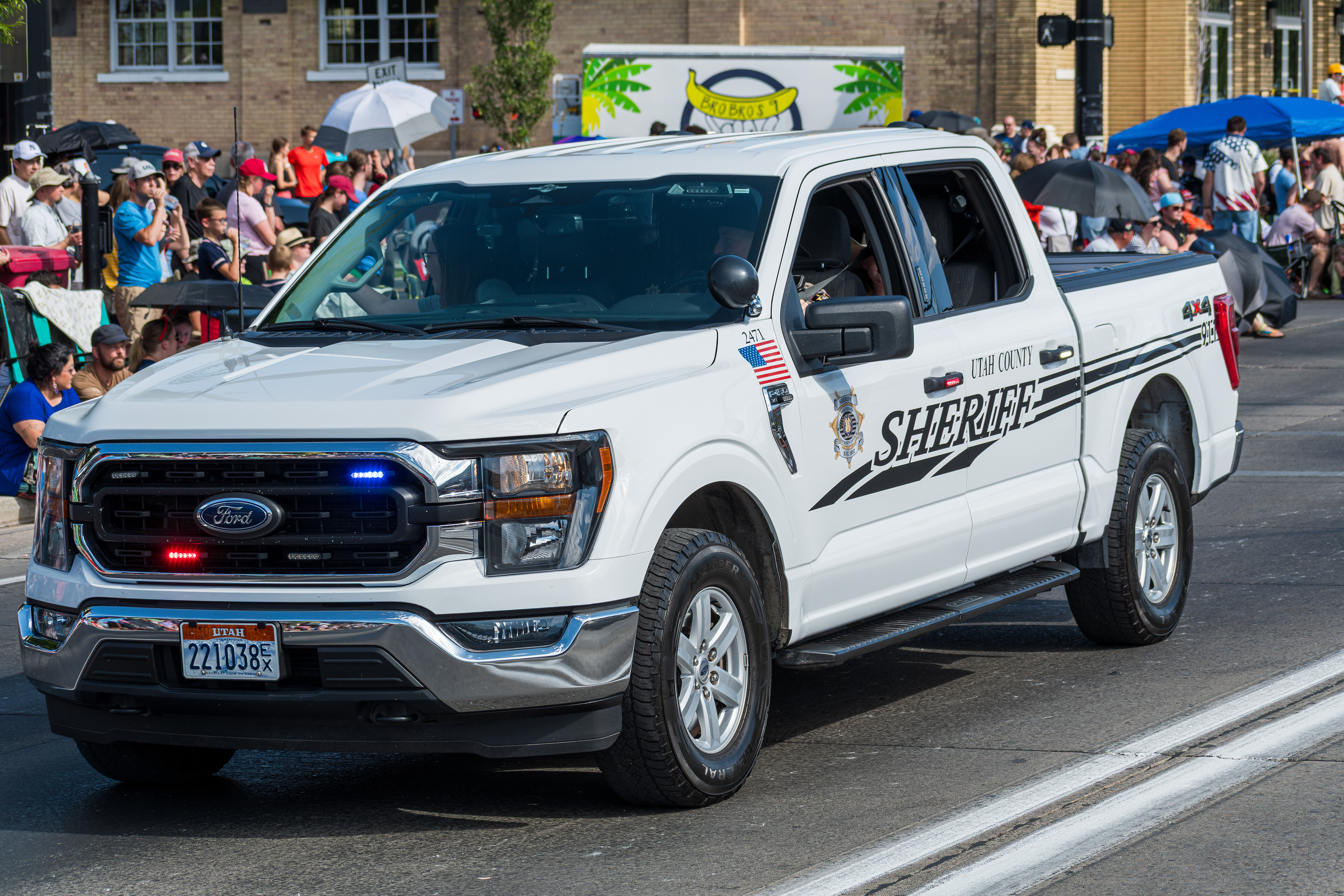 Provo, Utah – July 4, 2025: A Utah County Sheriff’s vehicle drives along the parade route during the Freedom Festival Grand Parade in downtown Provo.