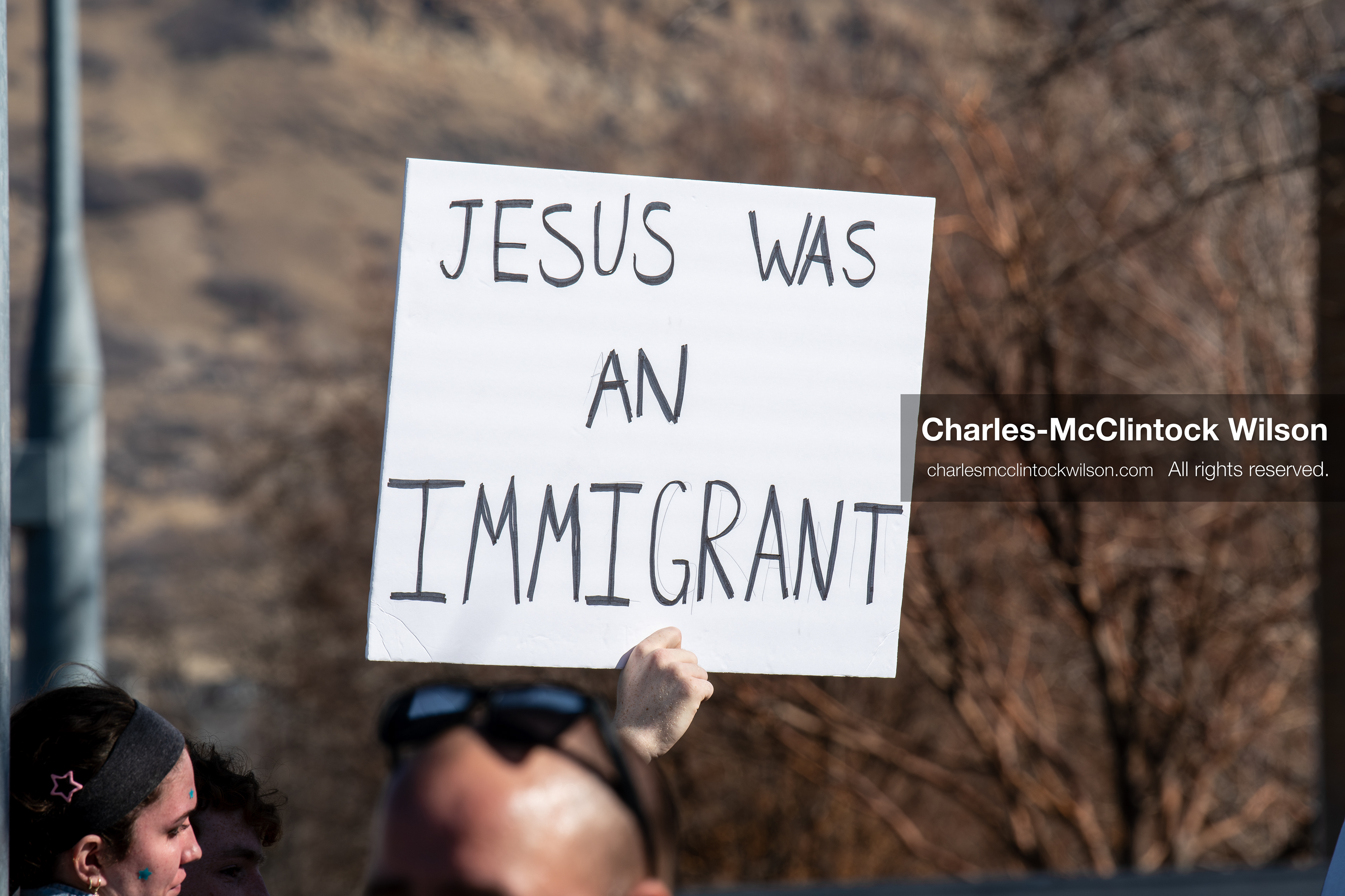 February 5, 2026, Provo, Utah, USA: A demonstrator holds a sign during a gathering near Brigham Young University in Provo where students and community members protested the presence of US Customs and Border Protection recruiters at a career fair held on the BYU campus. (Credit Image: © Charles McClintock Wilson/ZUMA Press Wire)