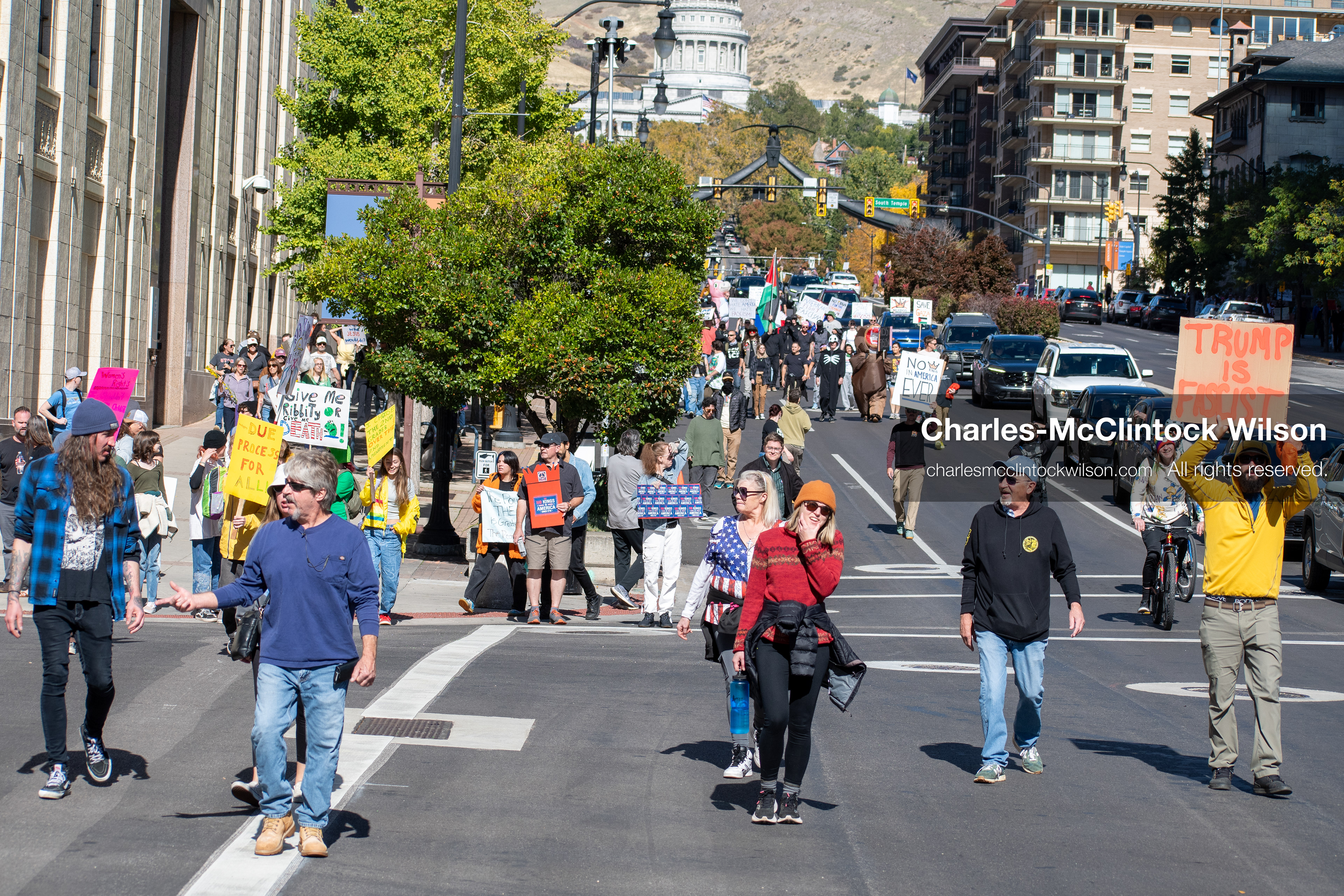 October 18, 2025, Salt Lake City, Utah, USA: Demonstrators march along South State Street during a "No Kings" protest in Salt Lake City, Utah. The protest was part of a nationwide mobilization.