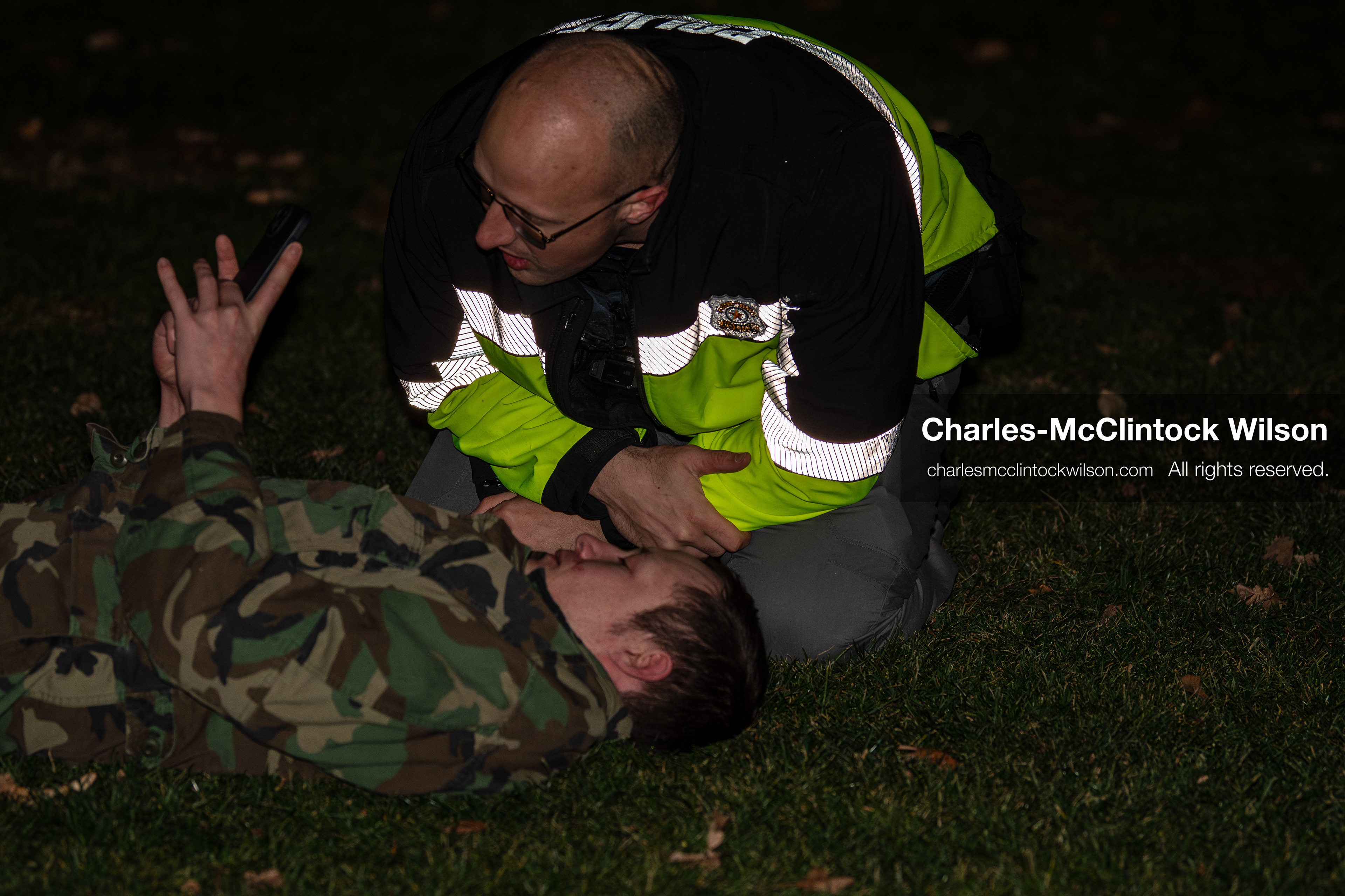 January 8, 2026, Salt Lake City, Utah, USA: A demonstrator lies on the ground after being hurt during a confrontation at an anti ICE protest at Pioneer Park in Salt Lake City Utah on Jan 8 2026. The individual is a supporter of US president Donald Trump and is being assisted by law enforcement at the scene. The rally followed the death of Renee Nicole Good during an encounter with immigration authorities in Minneapolis and drew hundreds calling for accountability and changes to enforcement practices. (Credit Image: © Charles-McClintock Wilson/ZUMA Press Wire)