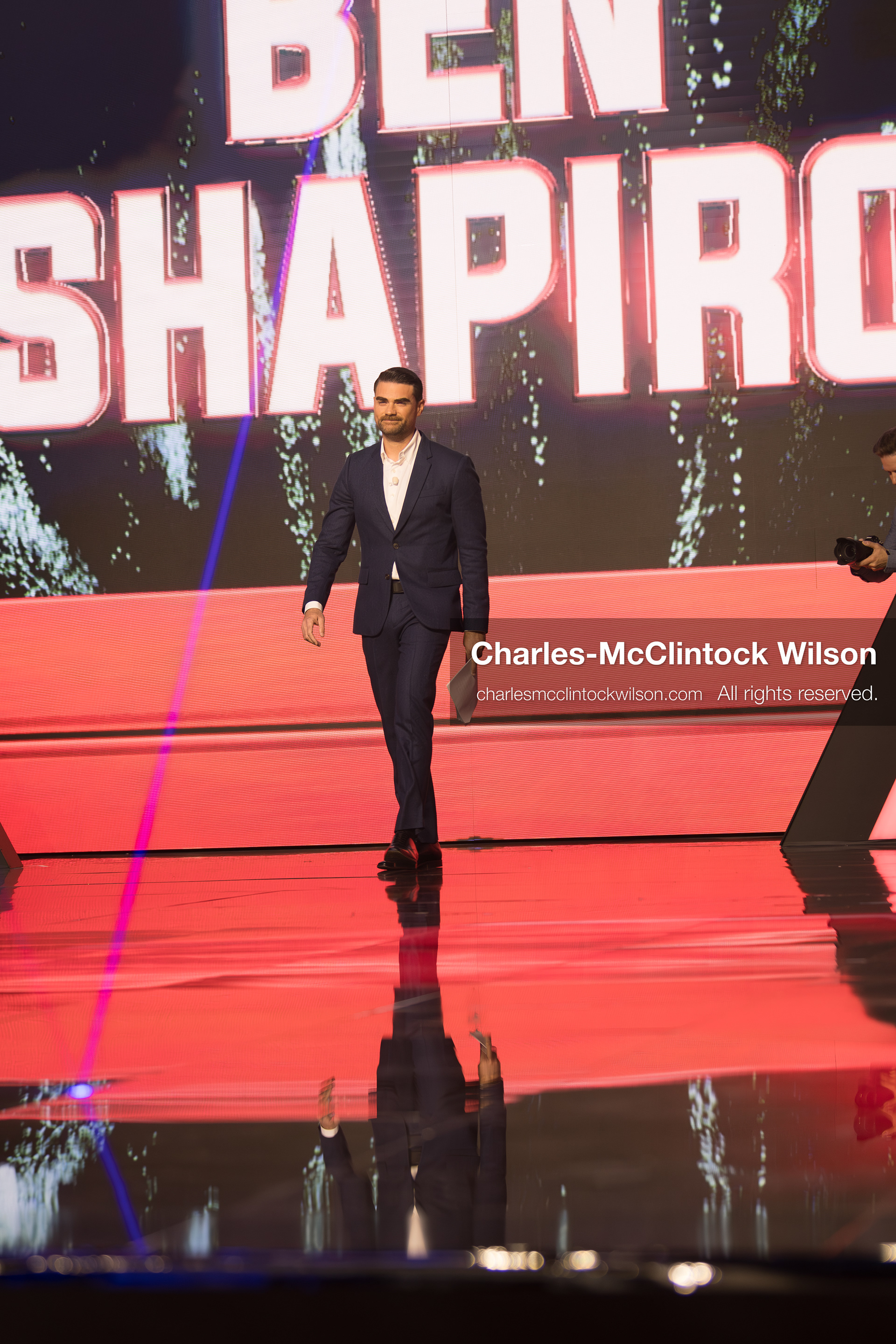December 18, 2025, Phoenix, Arizona, USA: Ben Shapiro walks toward the stage during Day One of Turning Point USA’s AmericaFest 2025 at the Phoenix Convention Center in Phoenix, Arizona.