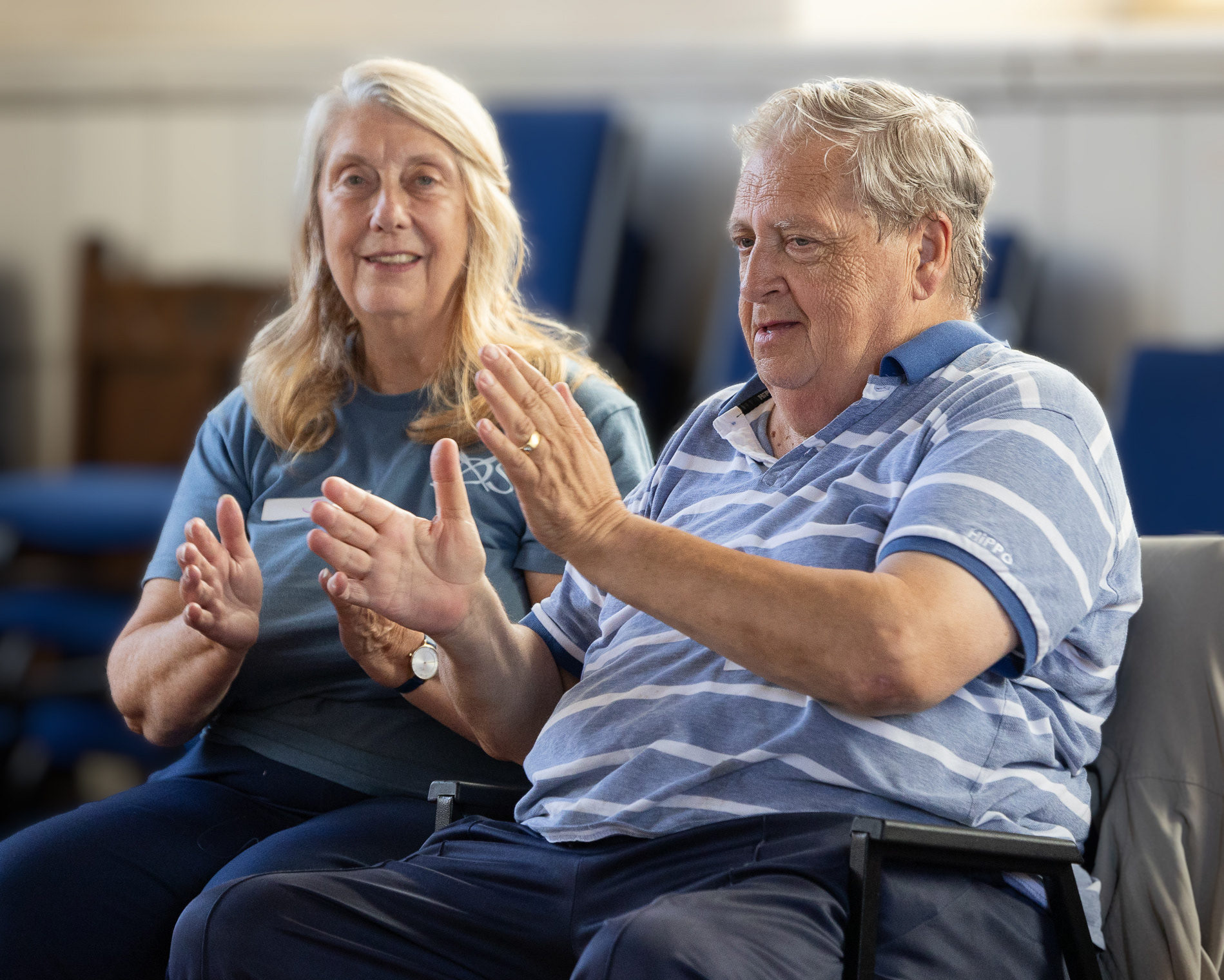 The benefits of seated dancing, happiness guaranteed! ©Anthony Brown Photography