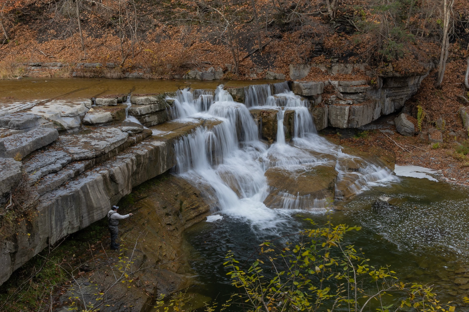 Waterfall fisherman