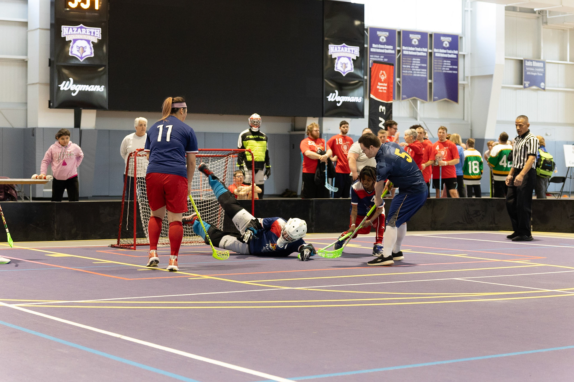 Manhattan Flames Goalie, Chris Clarke, blocking a shot during floorball competition at the Golisano Training Center at Nazareth University in Rochester, N.Y., Feb. 22, 2025. (Photo by Reed Newton)