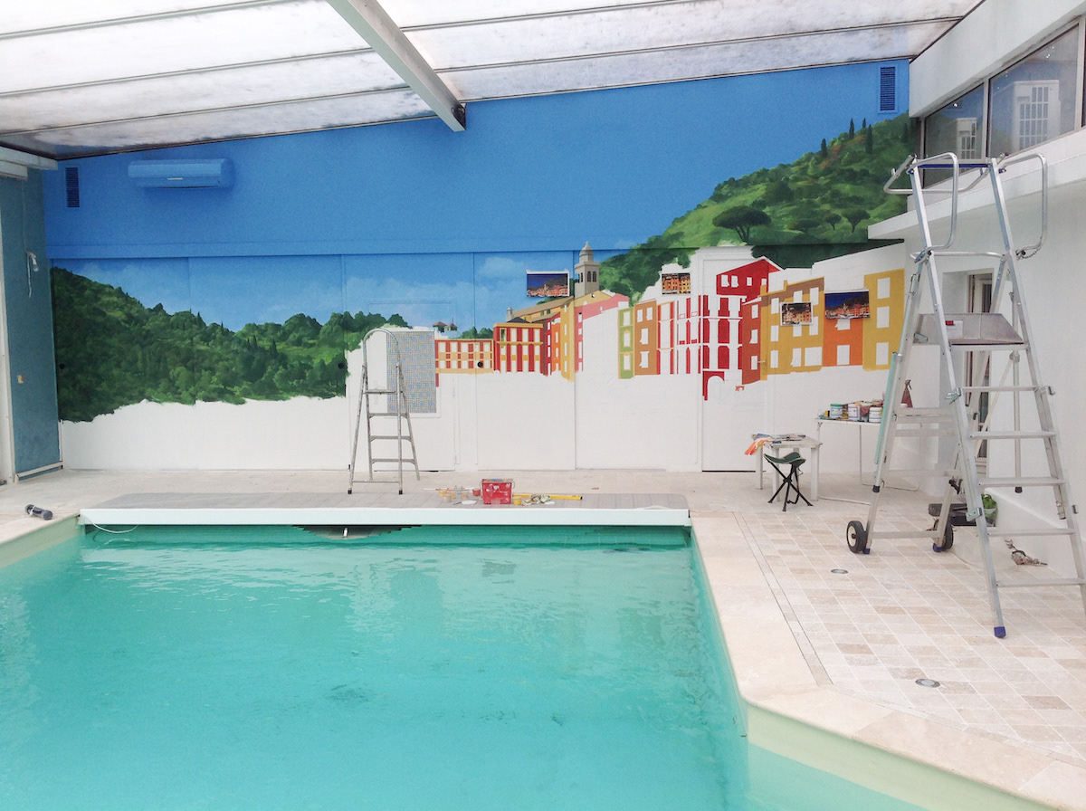 Private home. Work on progress. A brightly coloured mural around a pool for a visually impaired person. Paris region