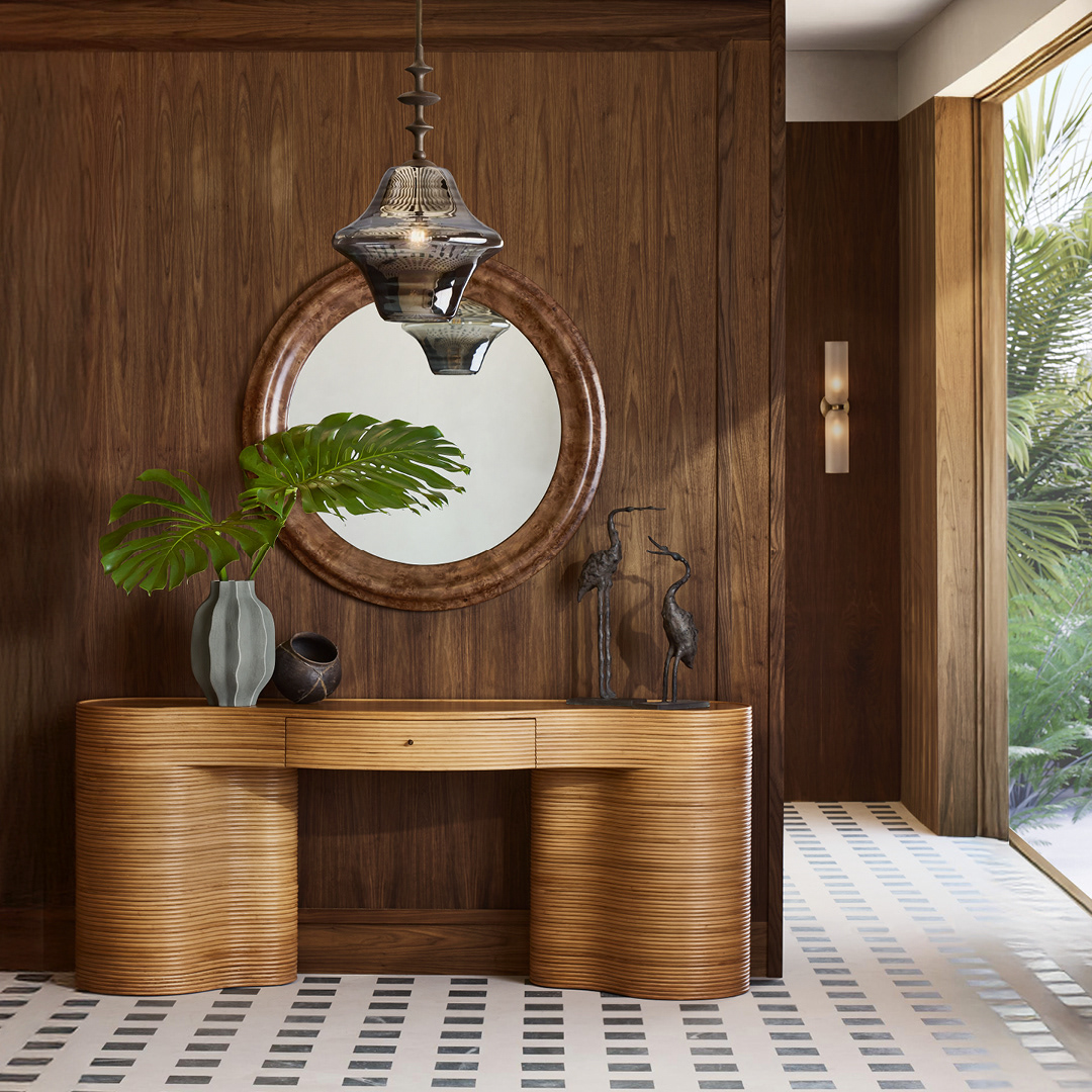 New! Delphine’s hand-wrapped rattan curves make a statement.