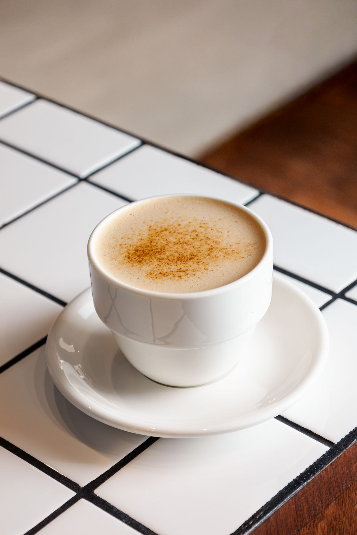 Warm coffee drink photo for an Amsterdam cafe.