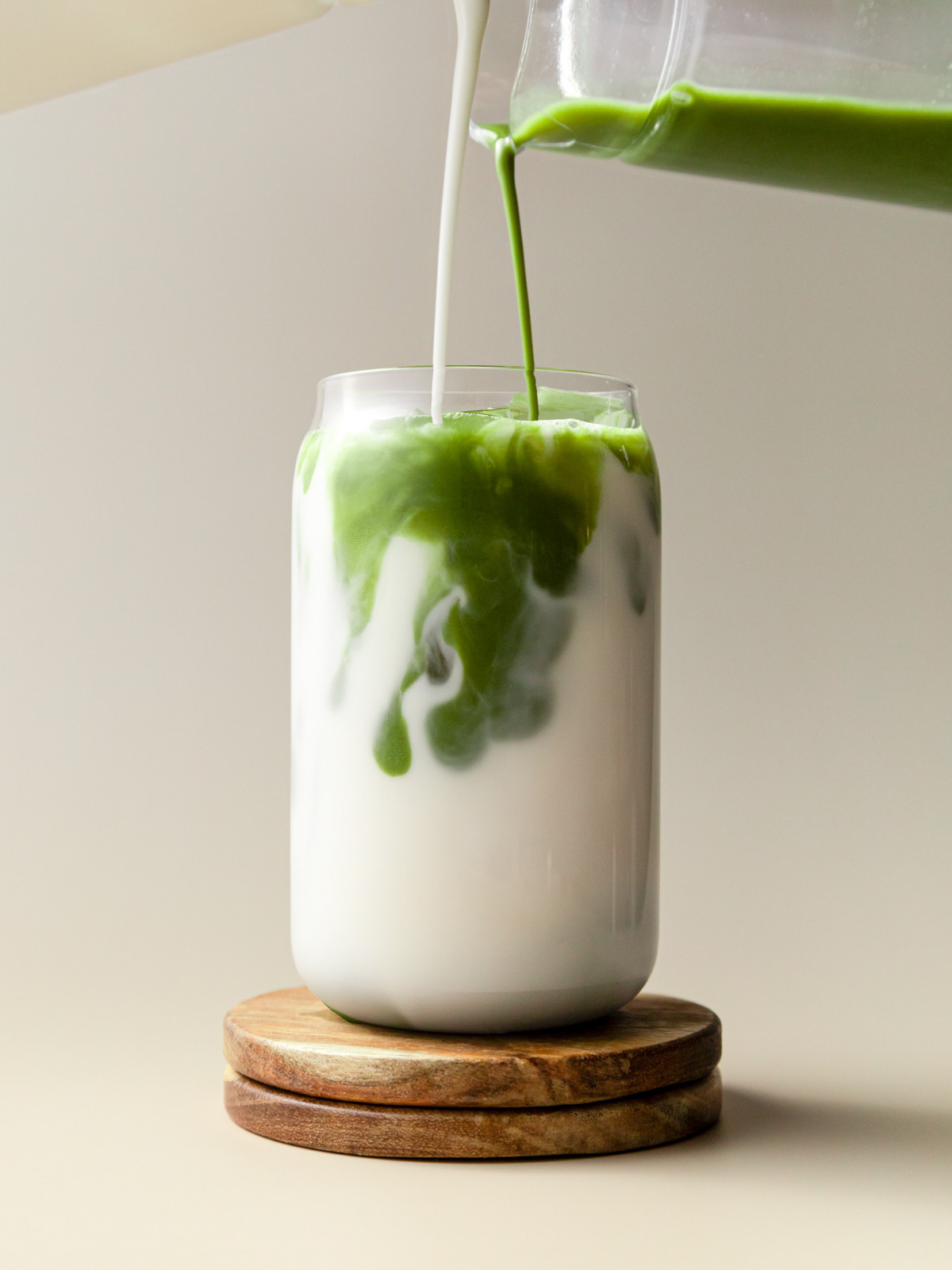 Pouring matcha latte - Jem Mantiri