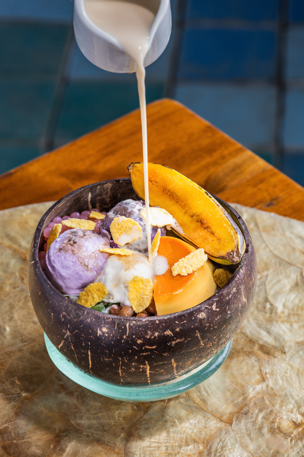 Filipino dessert, halo-halo, with a drizzle of the topping.