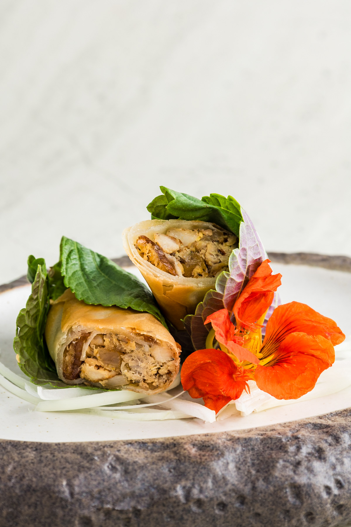 Spring rolls with perilla leaves, shot by Ubud photographer.