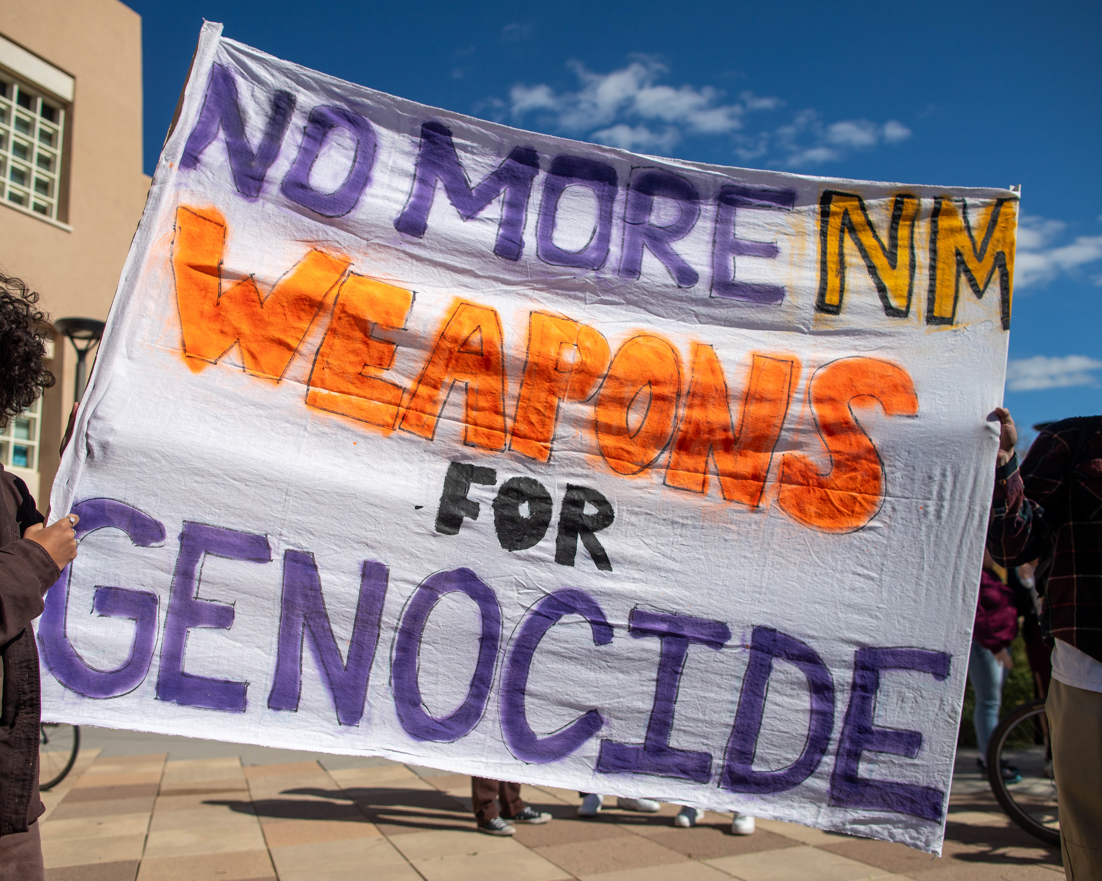 Sign carried by protesters outside Zimmerman Library in Albuquerque. November 9, 2023