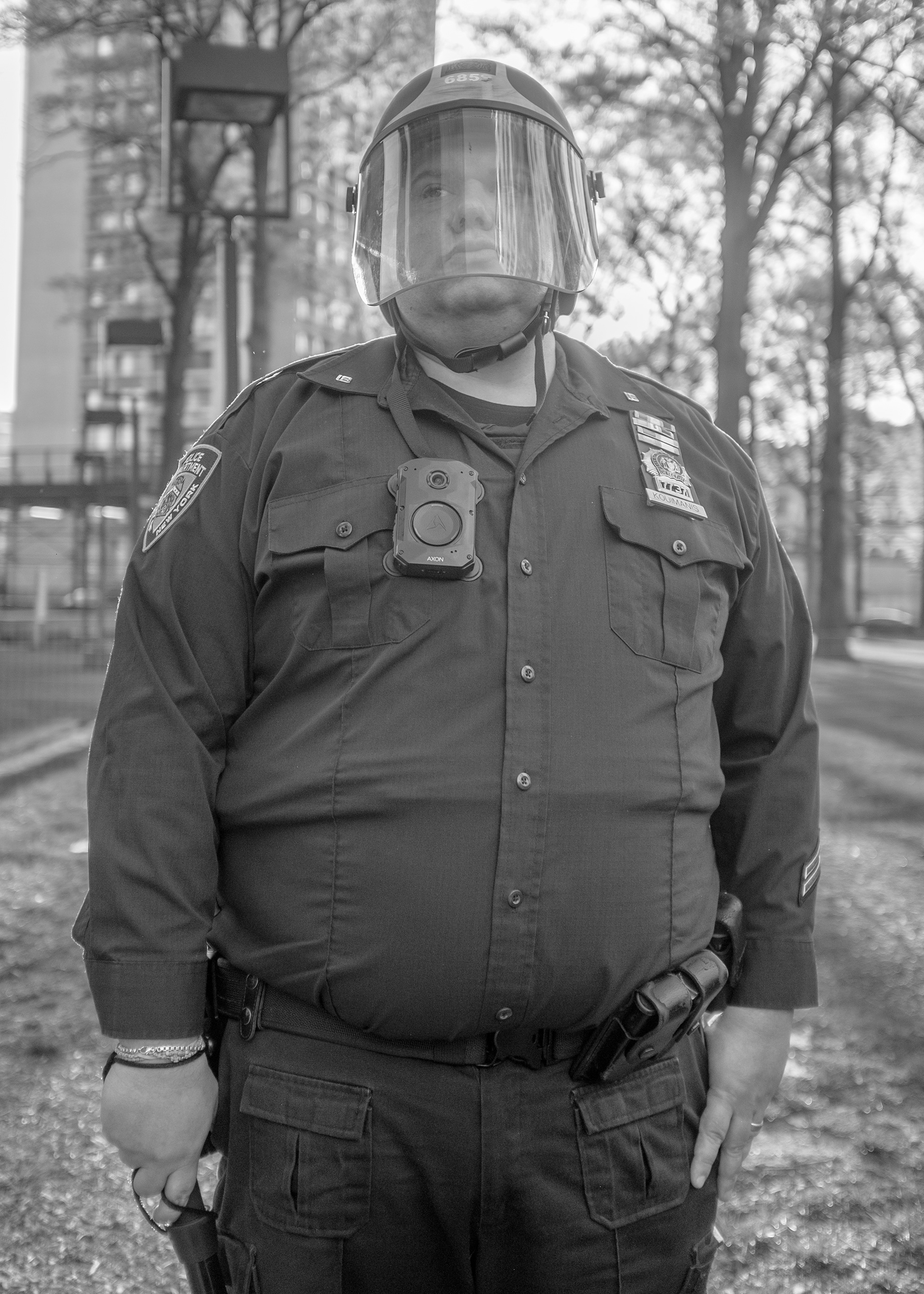 NYPD Officer Chrisova Kouimanis, badge #7737, clad in riot gear, stands ready at a protest outside the NYU John A. Paulson Center, New York City, on Friday, April 26. The demonstration, part of the wider reactions to the Israel-Hamas conflict, prompts police to prepare for encampment removals.
