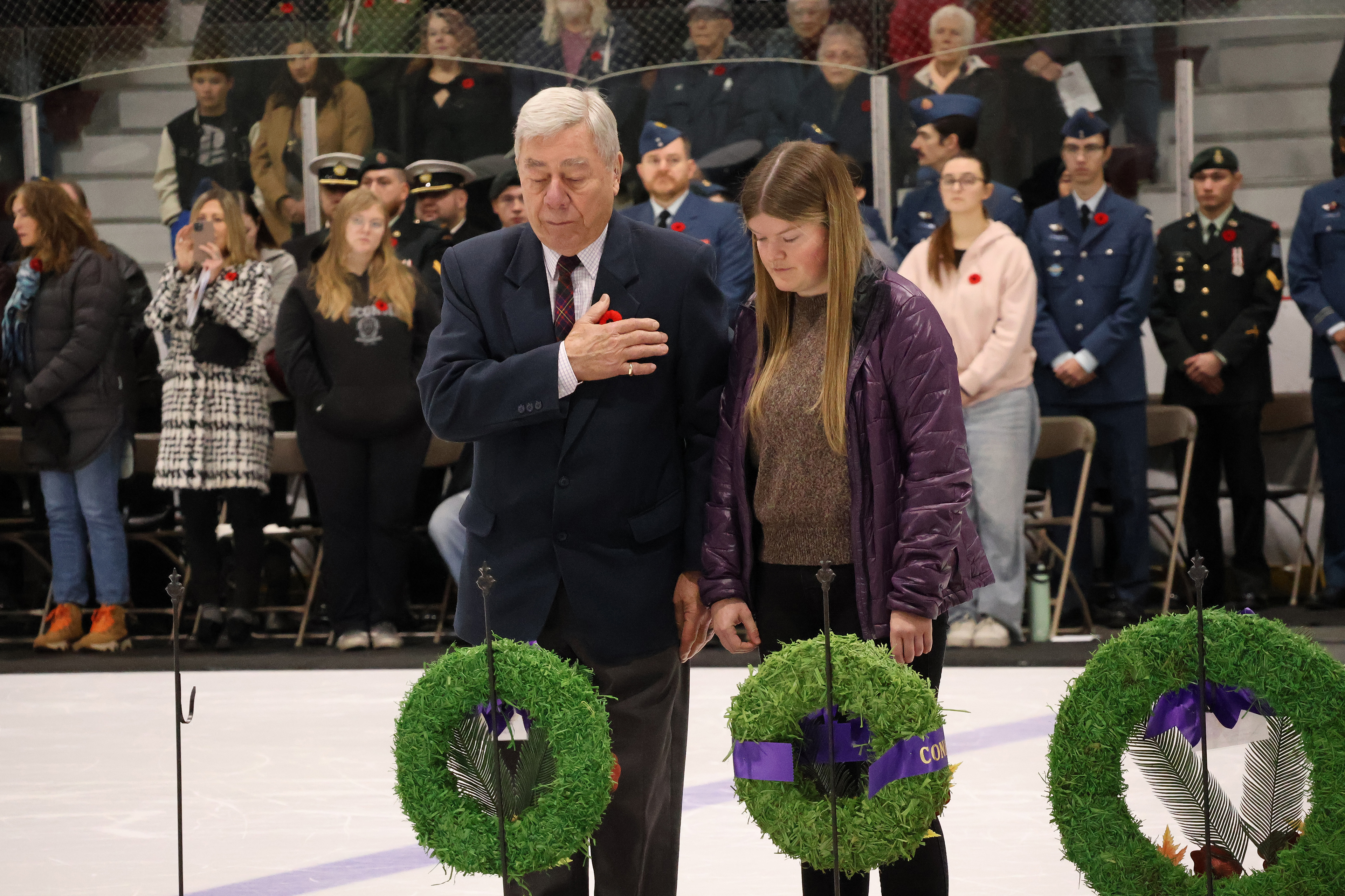 Ken Butchart and Rachel Penner remember fallen veterans.