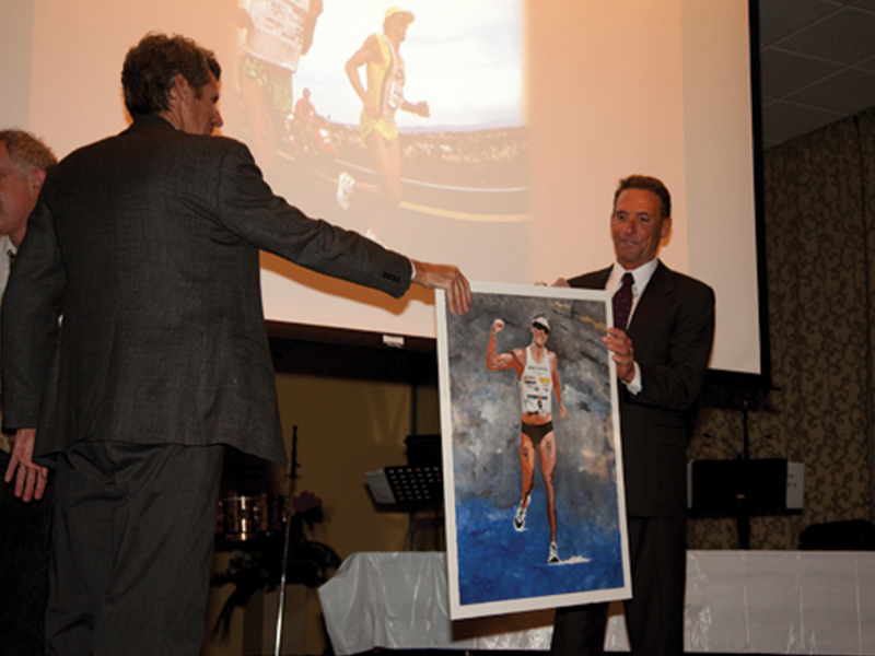 David Scott receiving his award and painting