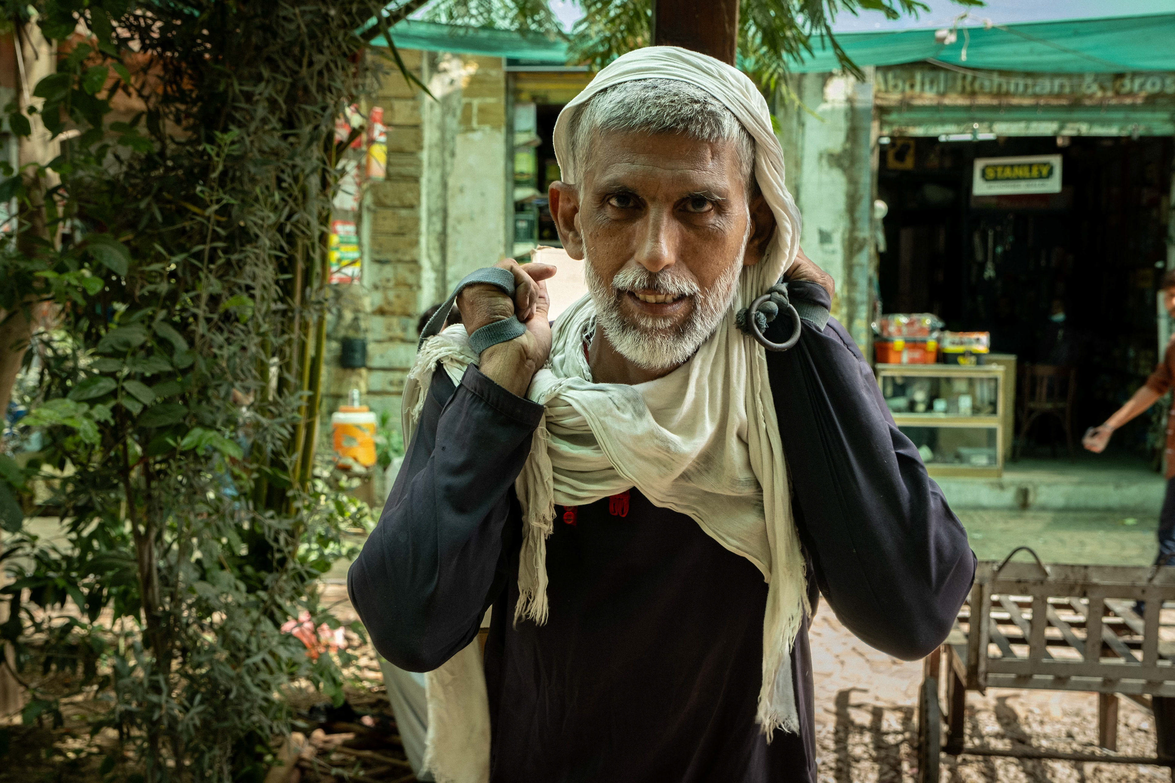 Trash carrier in Karachi, Pakistan