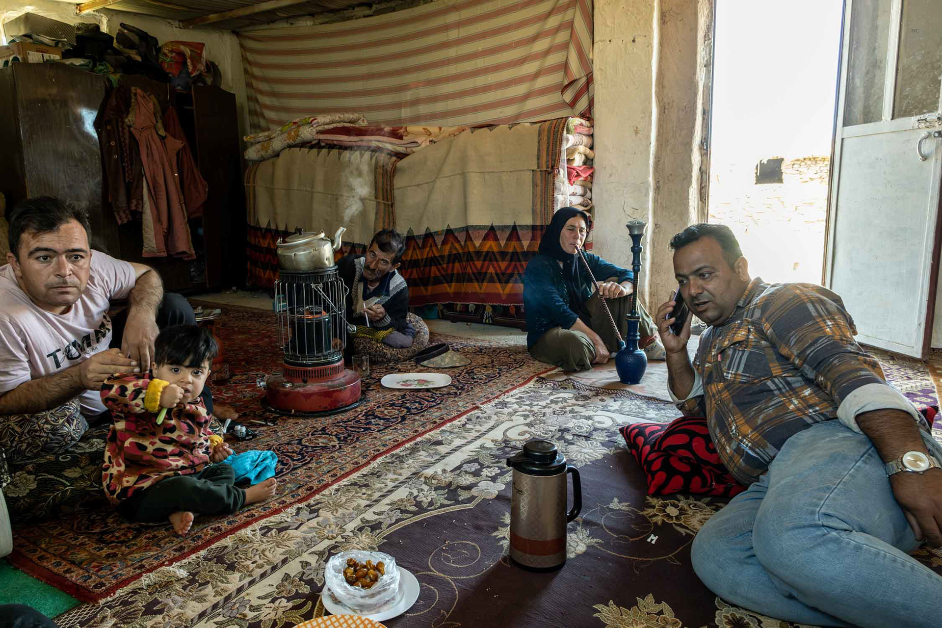 Qashqai settlers smoking opium and tobacco in the Zagros mountains, Iran