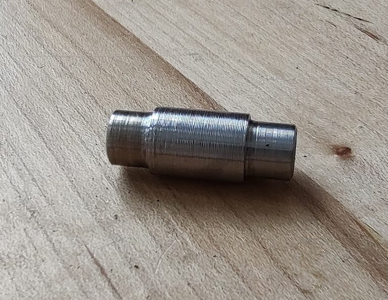 Stainless steel axles turned to spin in truck body