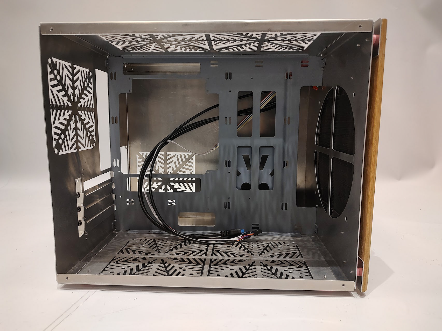 The inner panel of the case is painted to prevent the back of the motherboard shorting