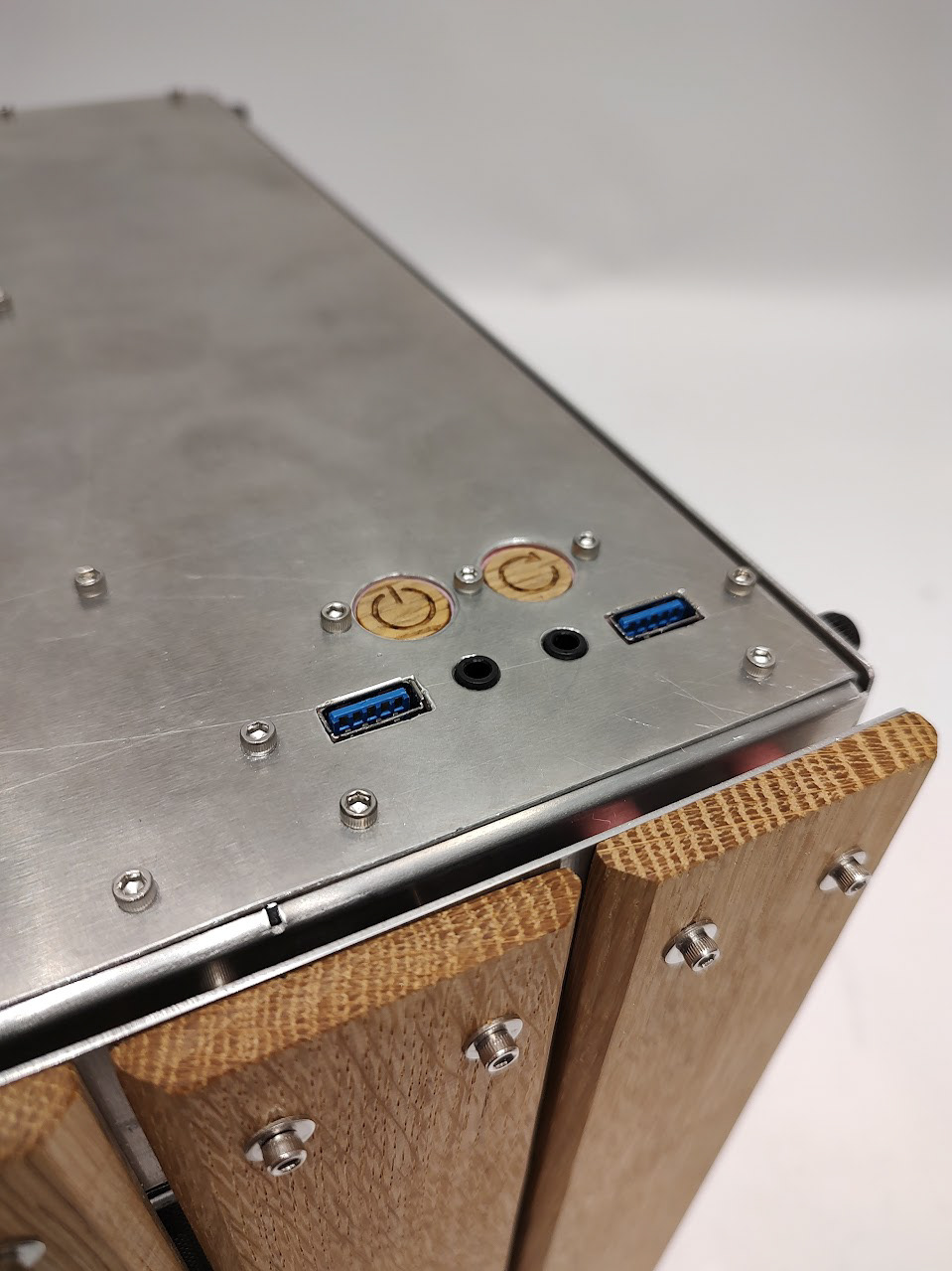 Front IO cutouts with custom wooden buttons