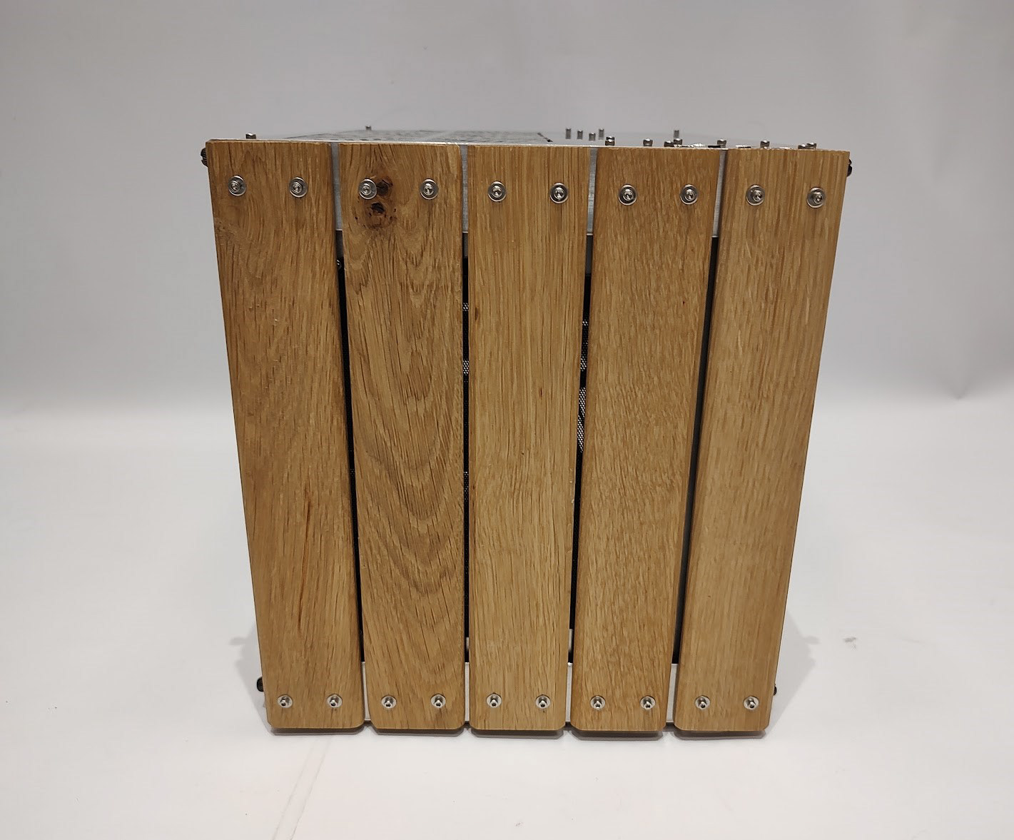 Wooden front of the case made from recycled pallet wood