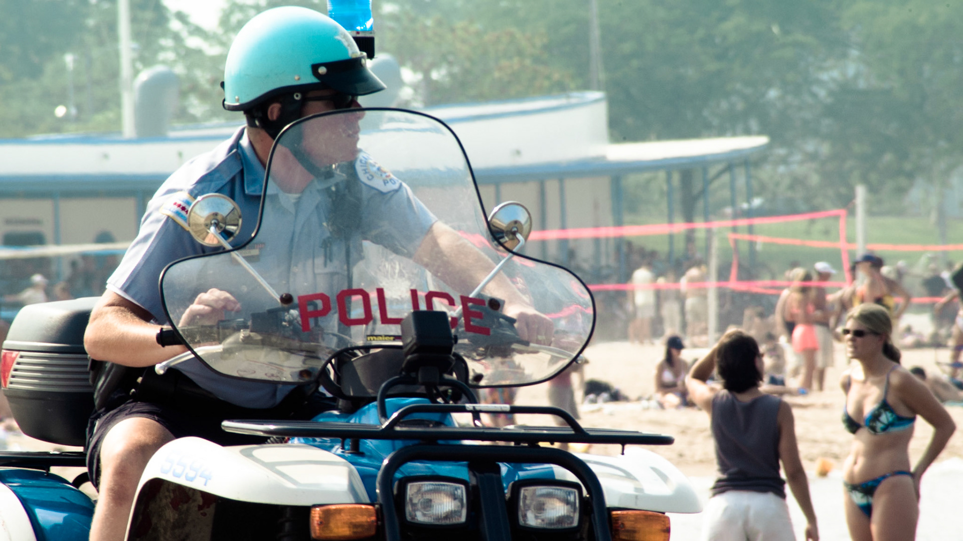 A mobile Chicago police officer patrols the North Beach section near the Beach House.