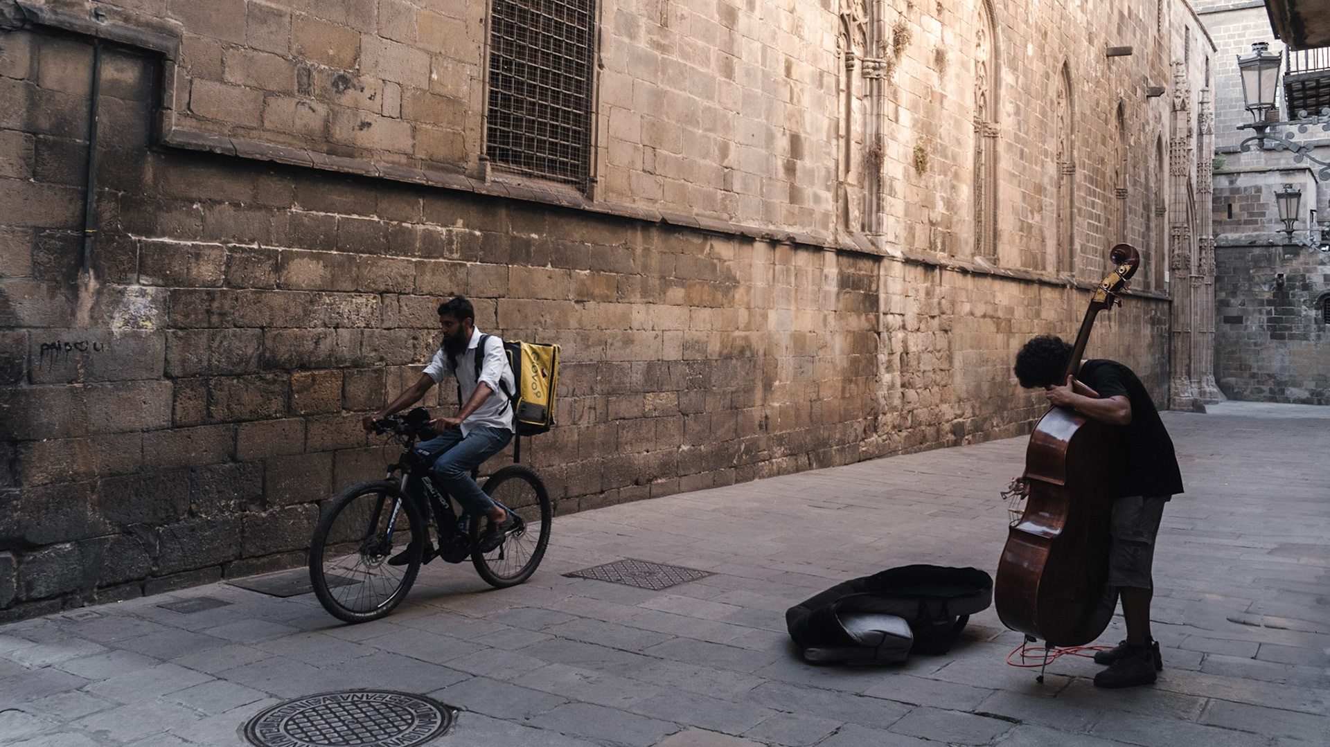 A musician plays classical music near the Palau de la Musica Catalana in Barcelona