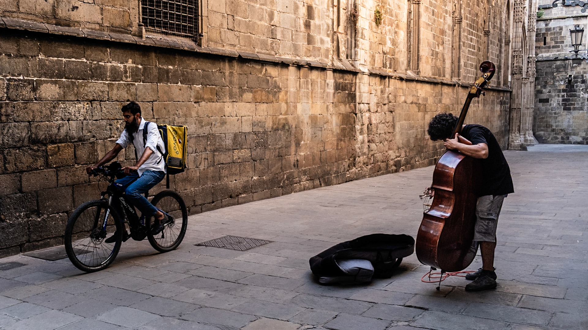 A musician plays classical music near the Palau de la Musica Catalana in Barcelona