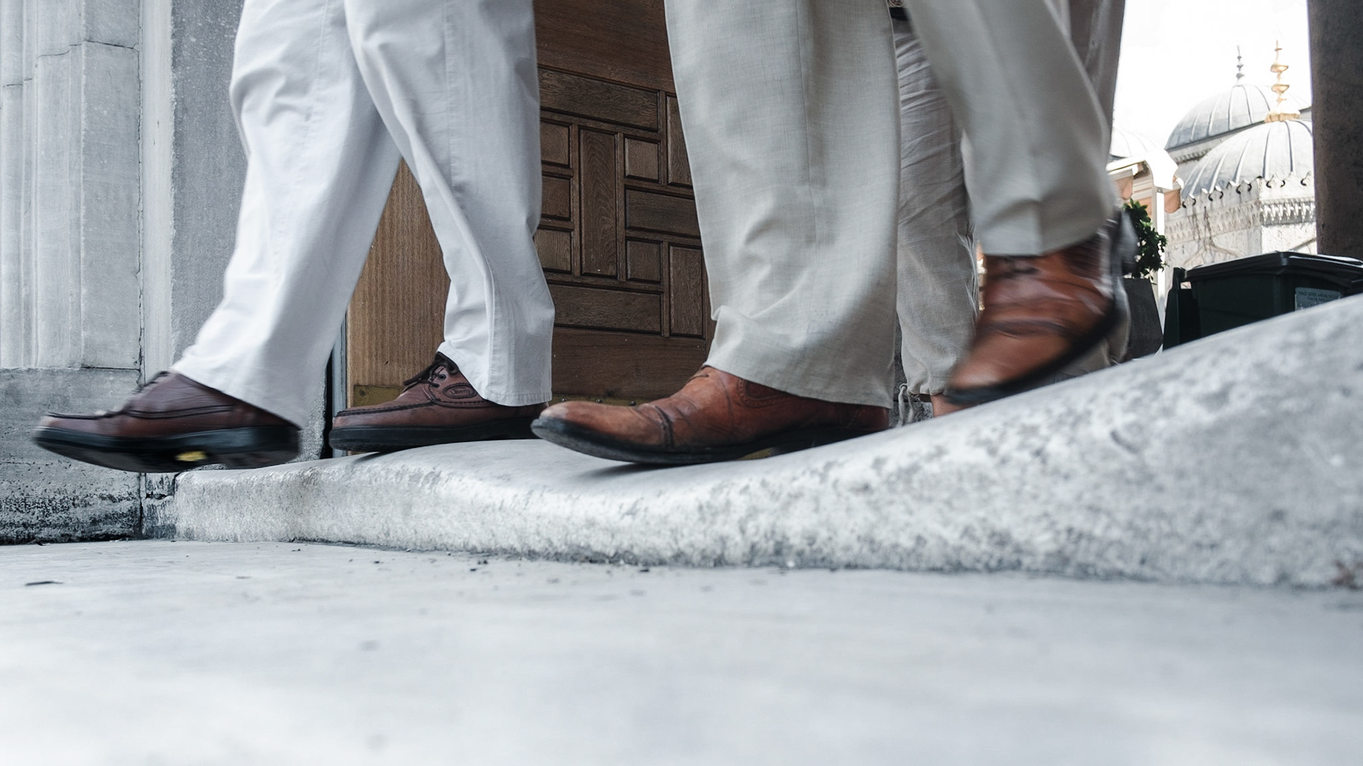 The deep depressions in the well-trodden stone threshold indicate the true age of the building.