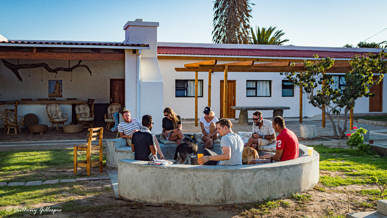 Friends visiting in the circle in the courtyard.