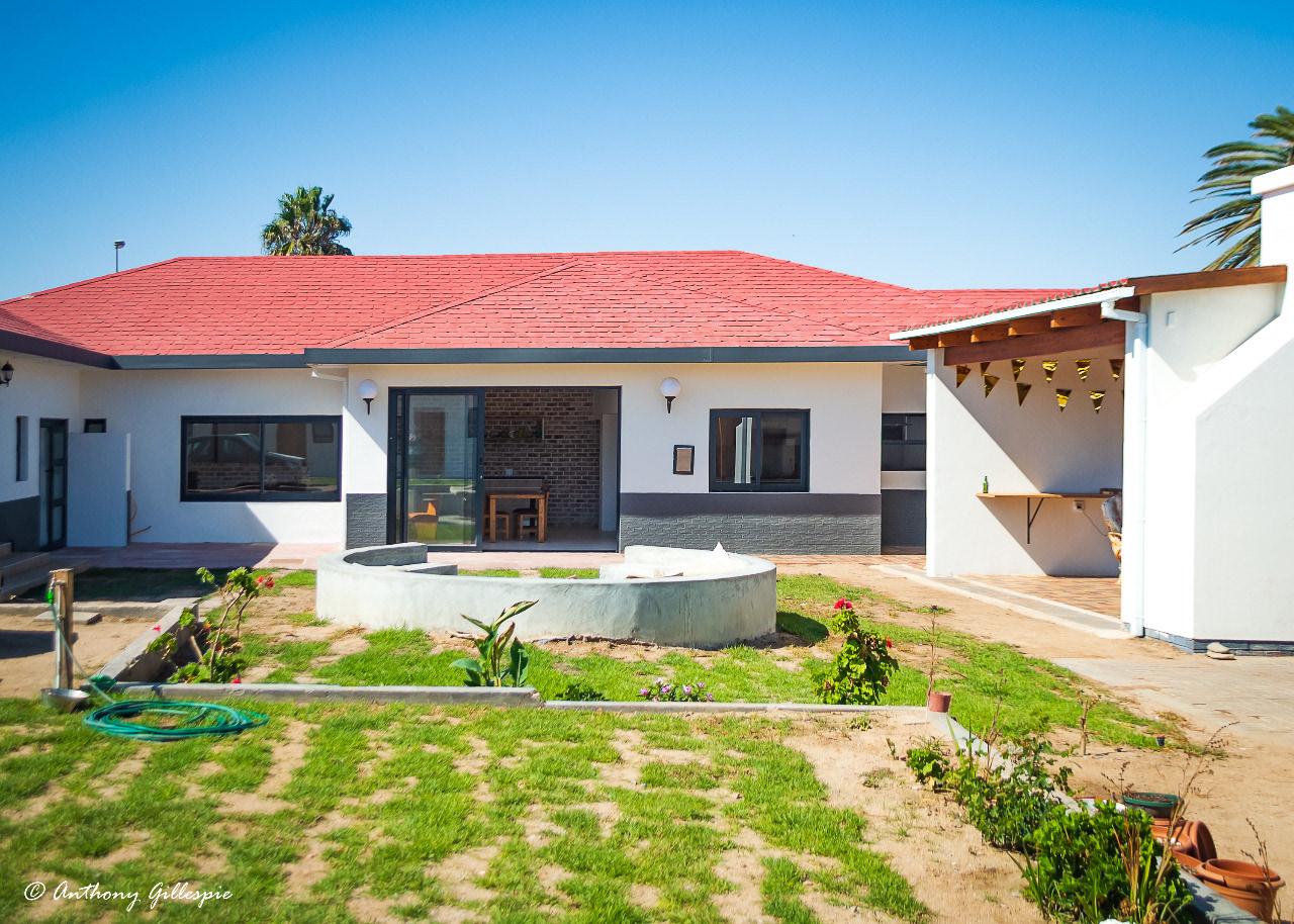 A view of communal living areas from the back rooms.