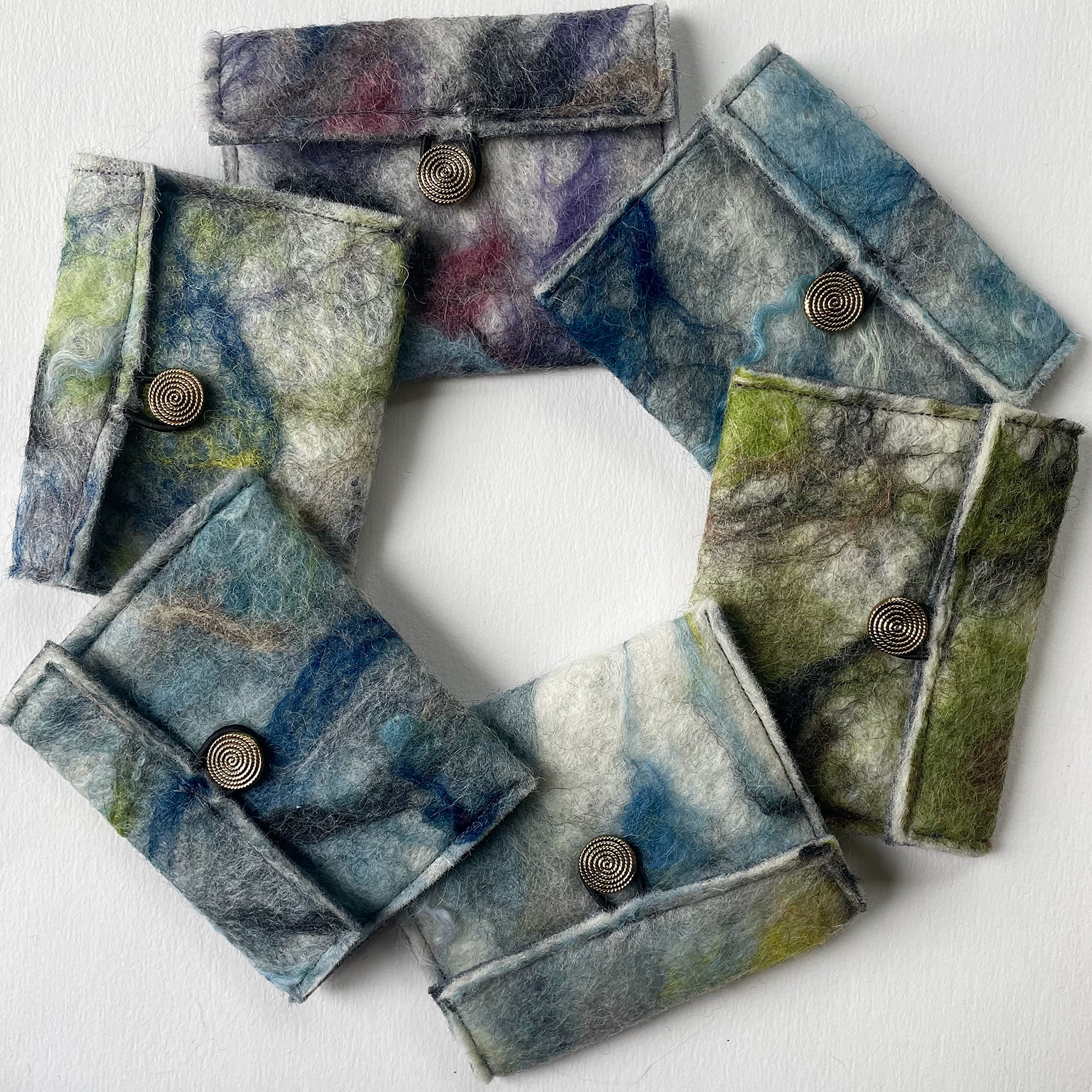 Hand felted and sewn purses