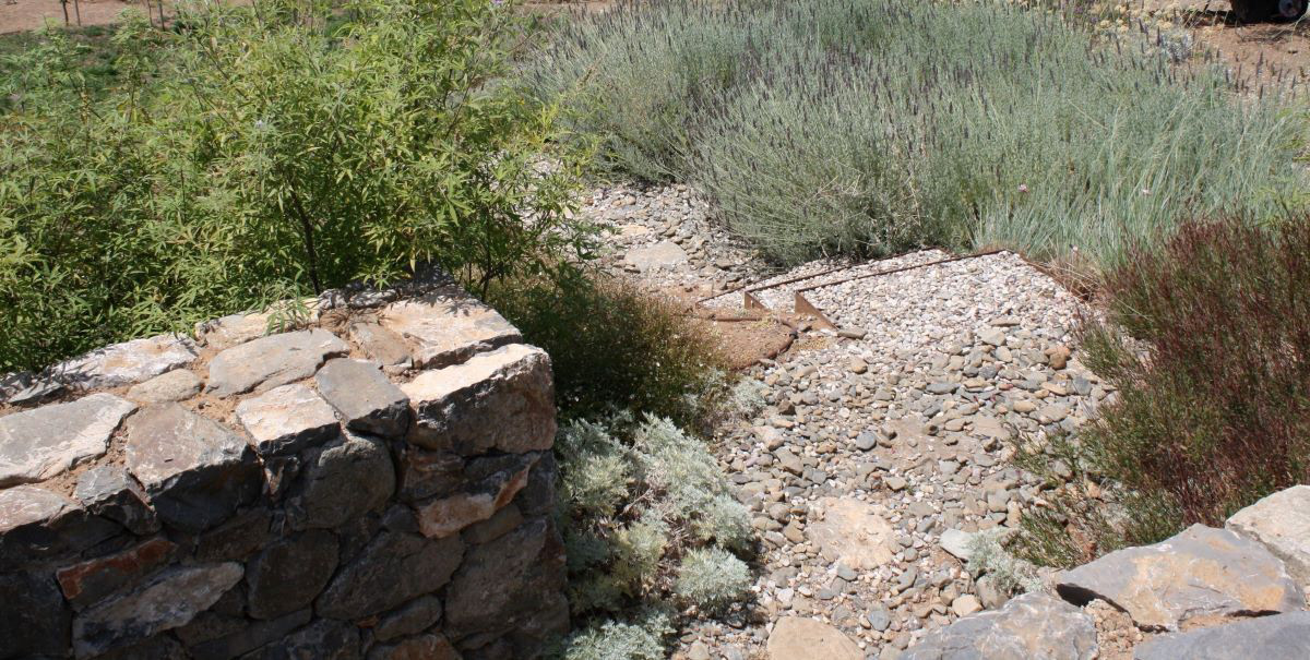 steel steps and pebbles