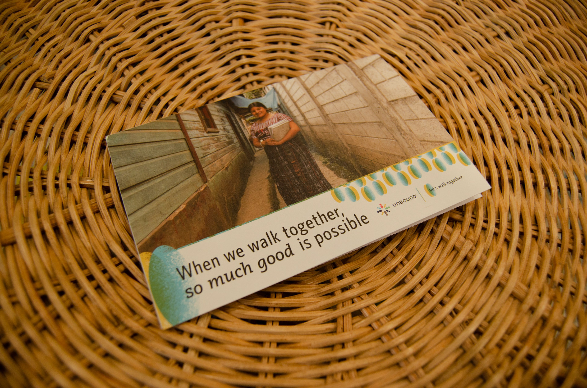 The front of a direct mail piece thanking sponsors and asking them to share Unbound with friends.