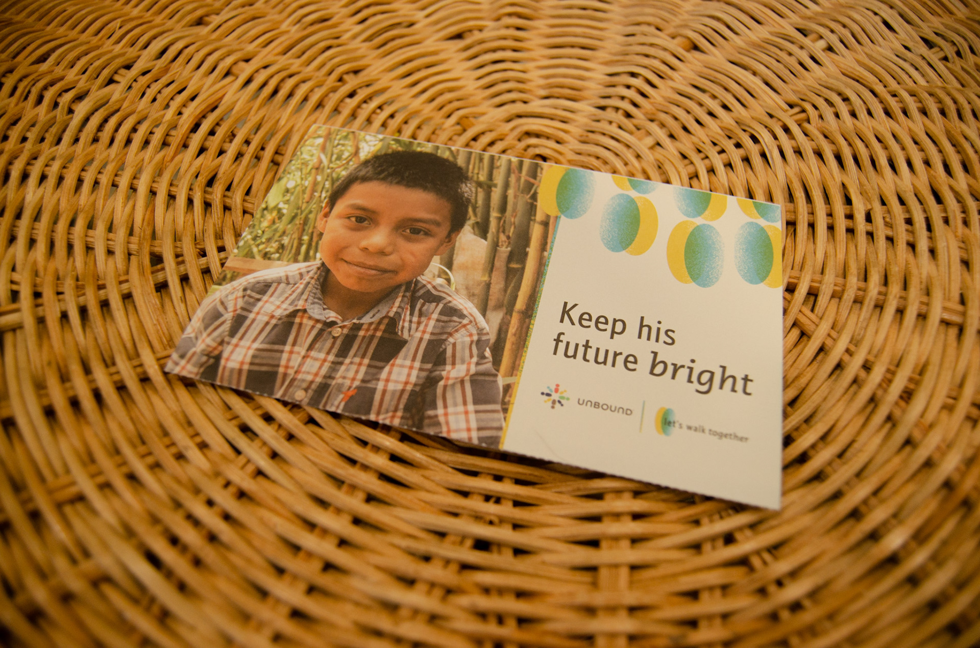 The front of a direct mail piece that specifically focuses on sponsoring Guatemalan boys.