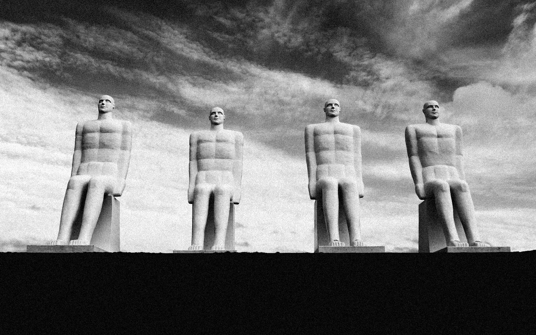 Man at Sea is a scupture outside of Esbjerg in Denmark. The scuptures are looking at the sea. https://en.wikipedia.org/wiki/Men_at_Sea