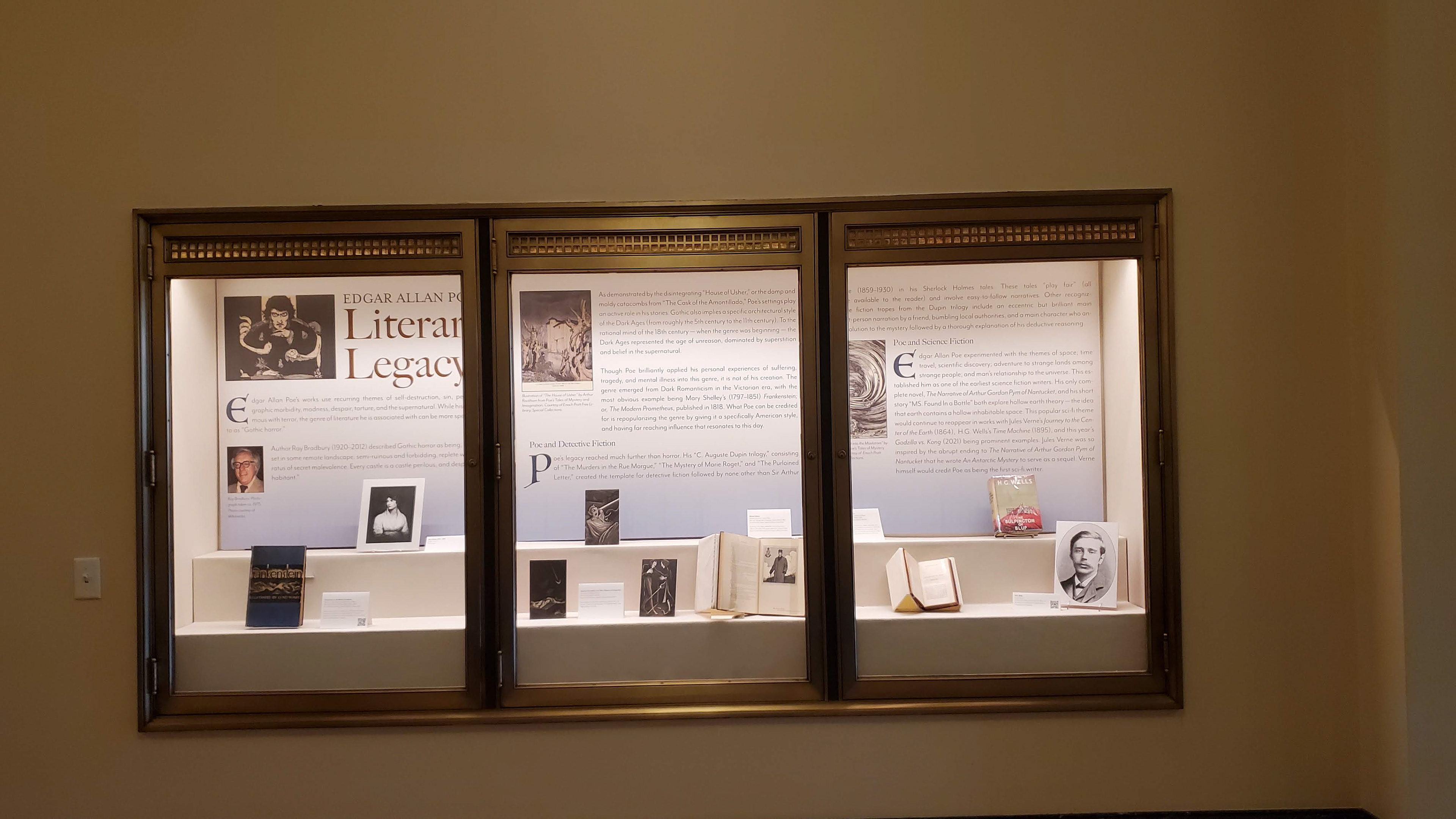 Literary Legacy panel set installed for the Life & Legacy of Edgar Allan Poe, 2020. Additional artifacts and hand made replicas were installed in the case.
