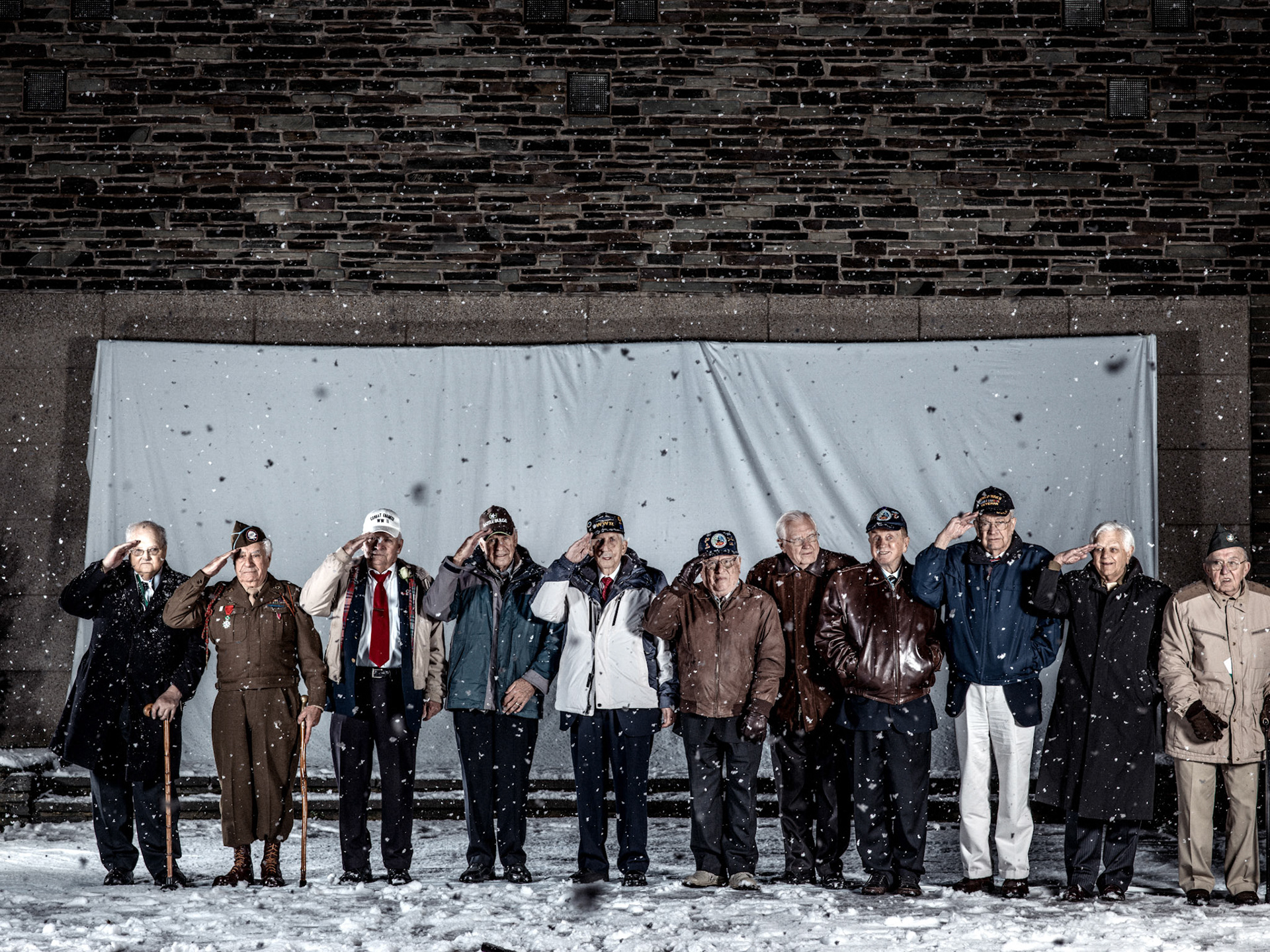 Group portrait of former American soldiers at Bastogne (B) in December 2014