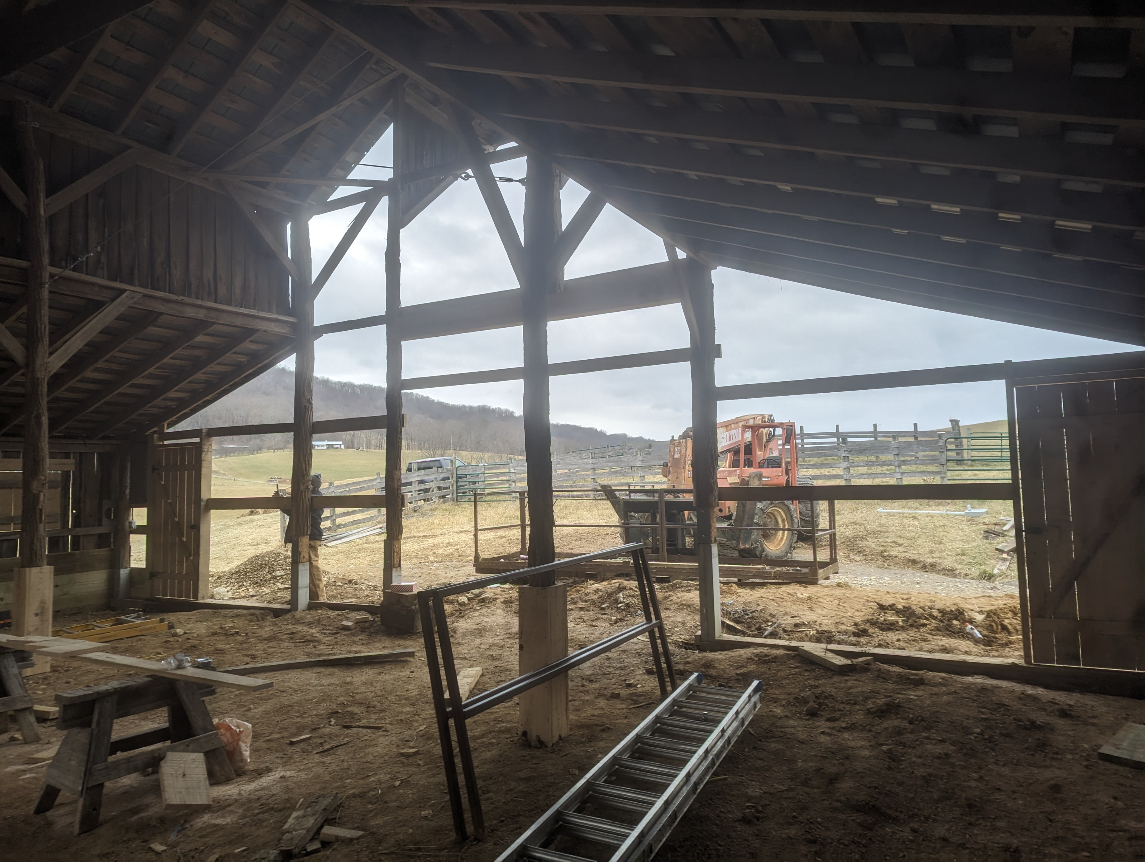 This view shows the concrete pillars and metal jackets that were used to attach the poles back into the new footers.