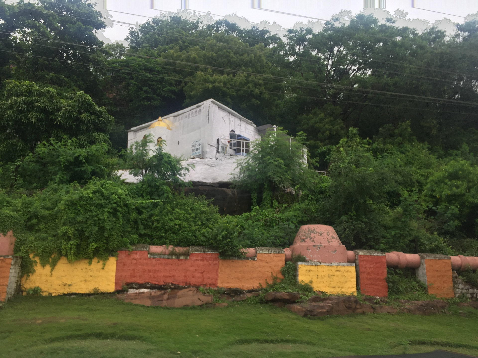 A Happy Memory // I have a vivid memory of this place, a house standing flamboyantly boasting of its glory in Bhopal's beautiful monsoons. The warm hues of color coated bricks contrasting the heavy blues of rain. The colors, the breeze, the purpose; everything was beautiful that day. 