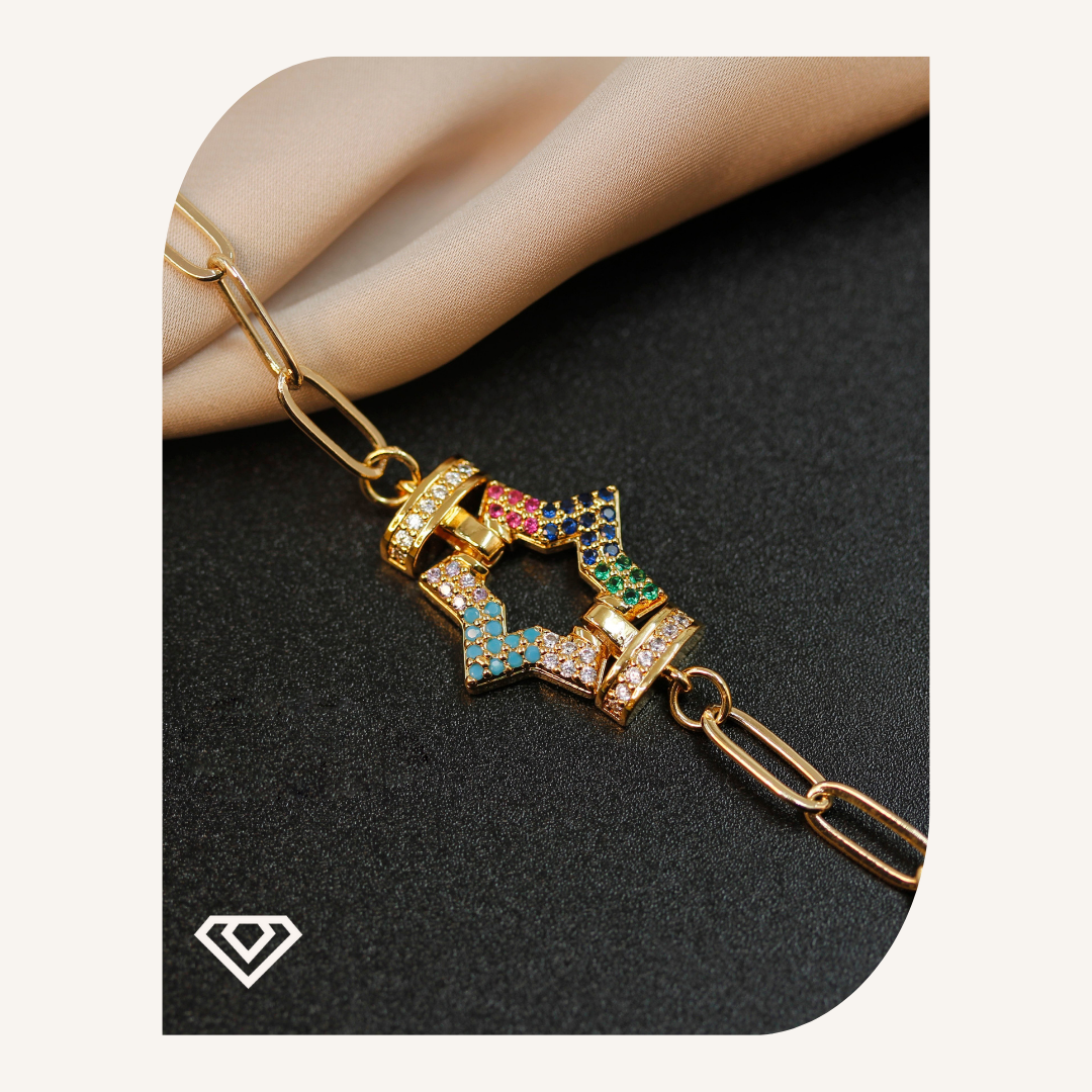 Pulsera acero entredije figura estrella destellos bicolor. Brilla por: 10900 crc