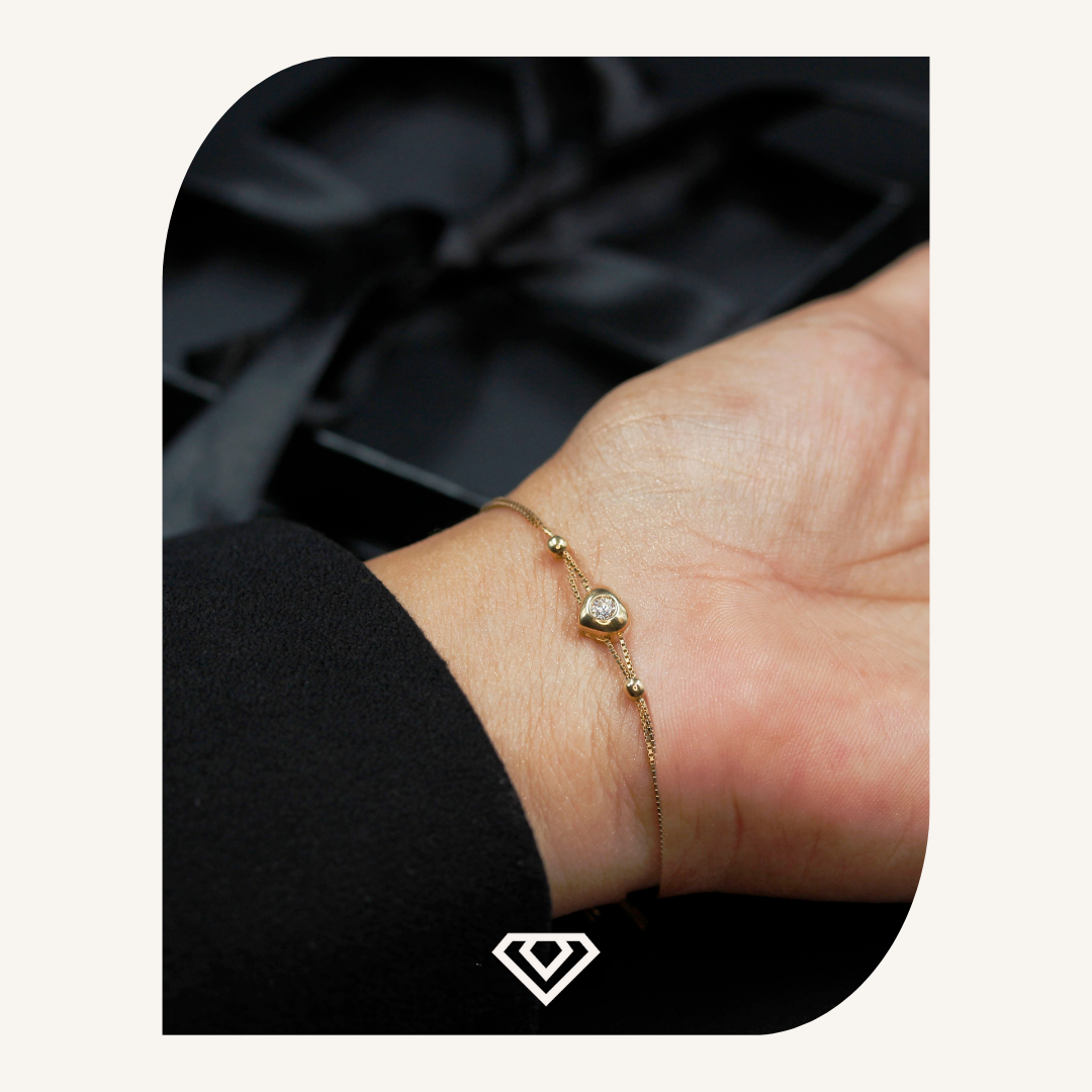 Pulsera Plata 925. Matices baño oro 18k. Entredije corazón. Brilla por: 15000 crc