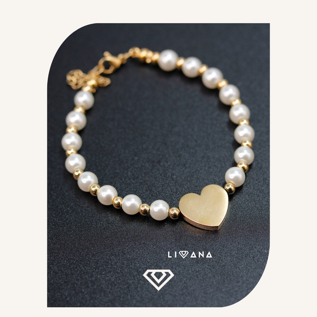Bello pulso diseño acero con perlas y entredije corazon. Brilla por: 8000 crc