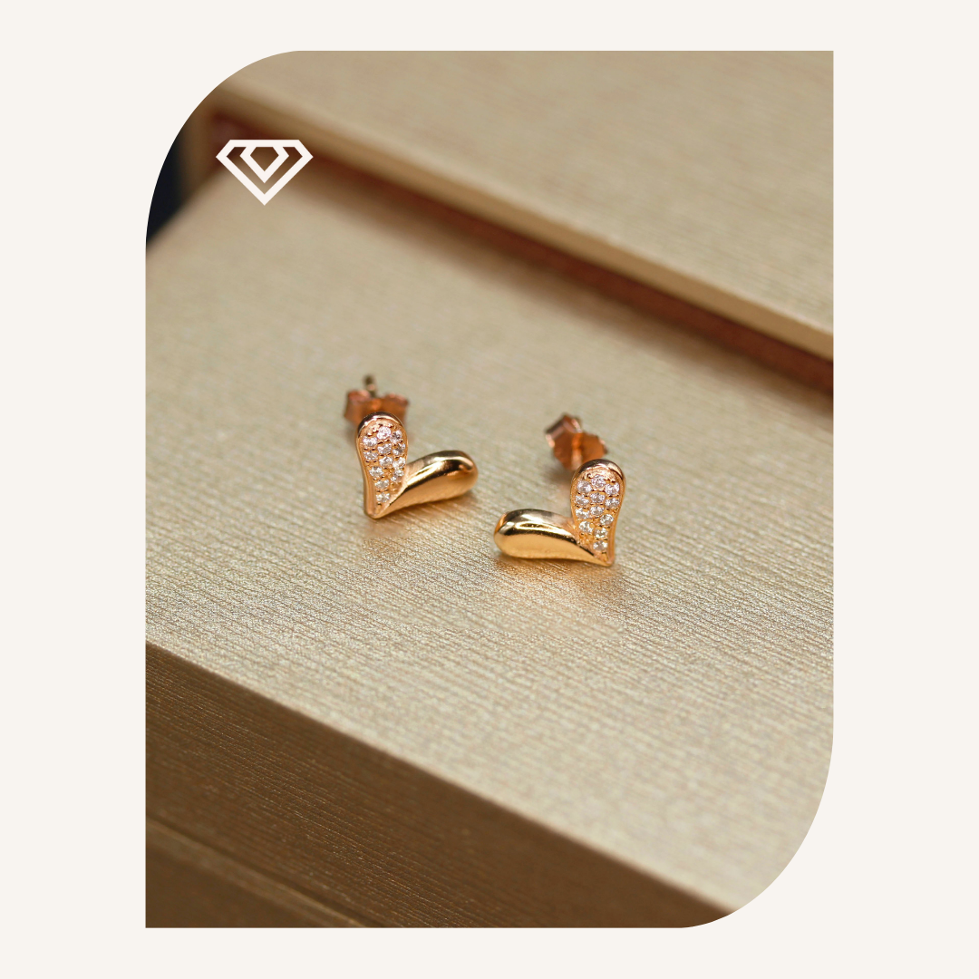 Corazones con destellos. Plata 925 en baño oro rosa. Brilla por: 8000 crc