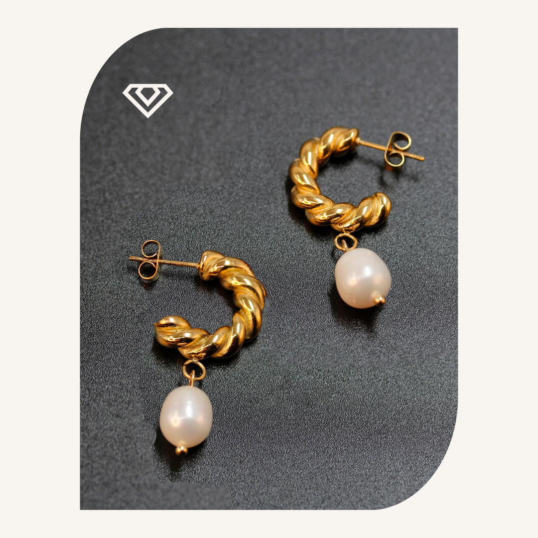 Pendientes acero colgantes de perla. Brilla por: 8500 crc
