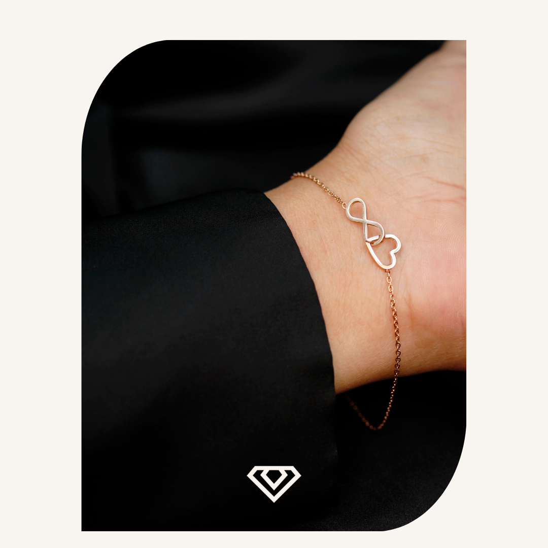 Pulsera diseño acero matices oro rosa con entredije corazón infinito. nfinito. Brilla por: 6500 crc