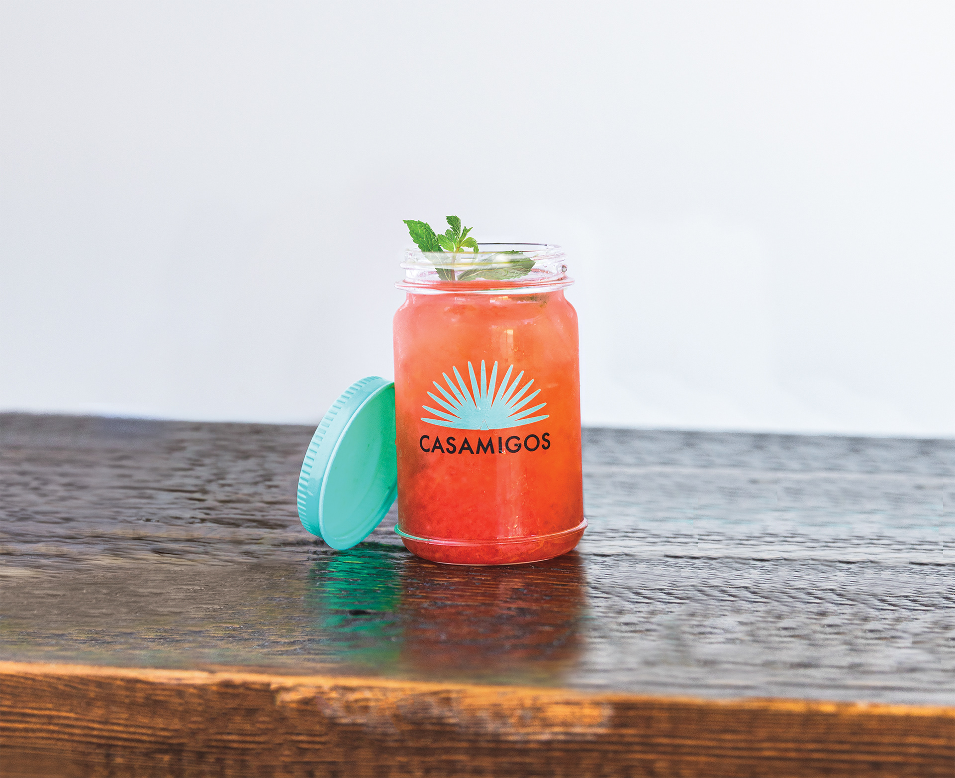 Casamigos Mason Jar Margarita (Edited): I adjusted the color of the drink and changed the garnish from a grapefruit slice to a mint sprig.
