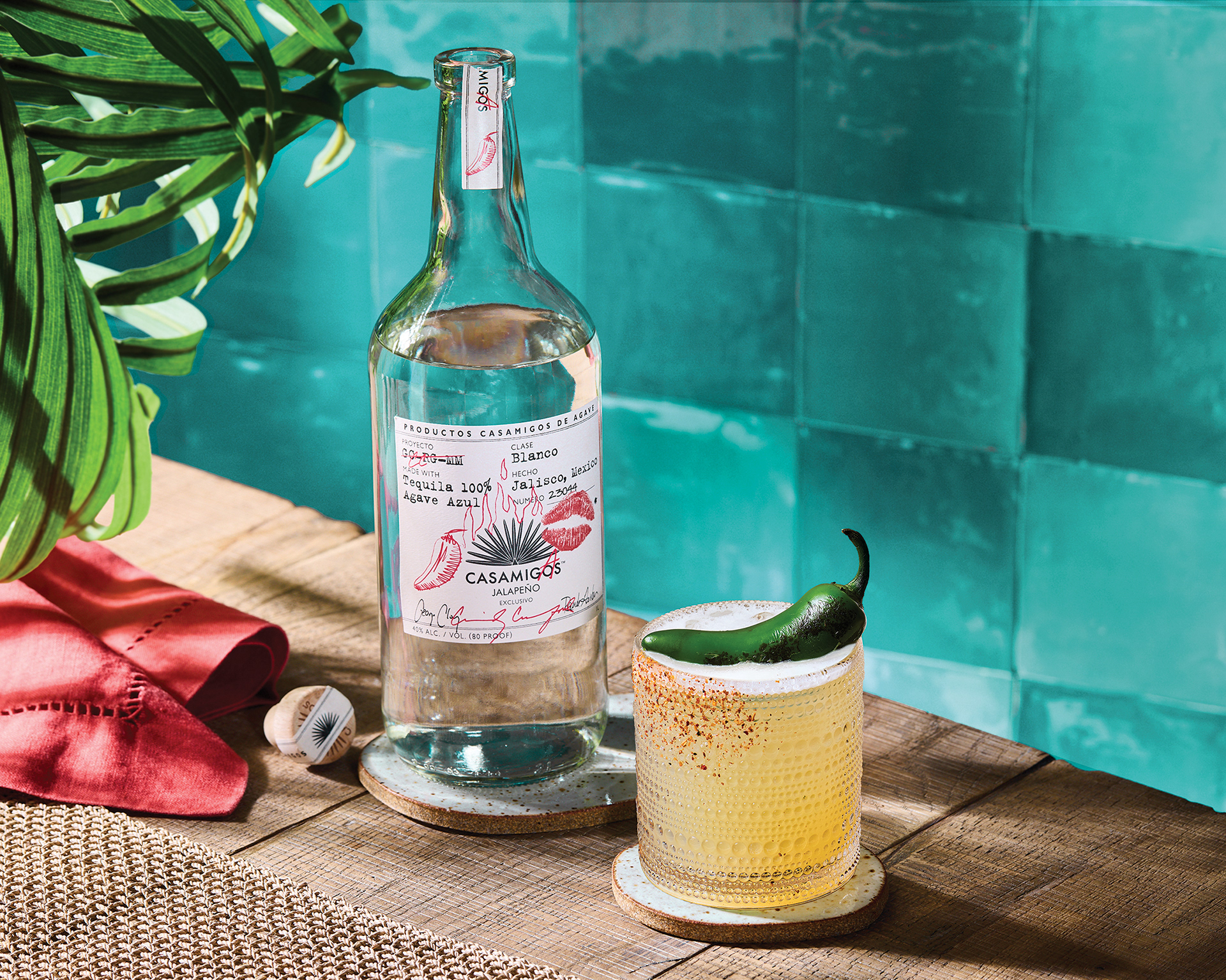 Spicy Margarita (Edited): I replaced the drink image, changed the background color to be closer to our signature teal, and move the plant leaves closer to the bottle.